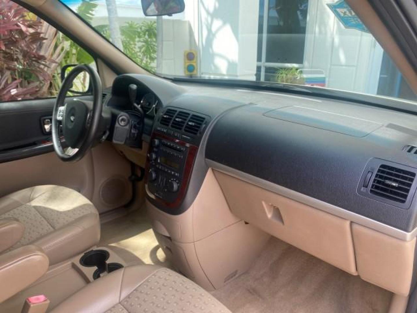 2007 Gold Mist Metallic /Cashmere Chevrolet Uplander LT LOW MILES 56,861 (1GNDV33197D) with an 3.9L V6 SFI Engine engine, Automatic transmission, located at 4701 North Dixie Hwy, Pompano Beach, FL, 33064, (954) 422-2889, 26.240938, -80.123474 - OUR WEBPAGE FLORIDACARS1.COM HAS OVER 100 PHOTOS AND FREE CARFAX LINK 2007 CHEVROLET UPLANDER LT VIN: 1GNDV33197D148165 1 G N D V 3 3 1 9 7 D 1 4 8 1 6 5 VAN 3.9L V6 F GASOLINE FRONT WHEEL DRIVE Features ABS Brakes Air Conditioning Alloy Wheels AM/FM Stereo Automatic Transmission CD Audio Cruise Con - Photo#98