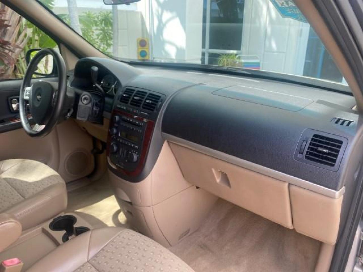 2007 Gold Mist Metallic /Cashmere Chevrolet Uplander LT LOW MILES 56,861 (1GNDV33197D) with an 3.9L V6 SFI Engine engine, Automatic transmission, located at 4701 North Dixie Hwy, Pompano Beach, FL, 33064, (954) 422-2889, 26.240938, -80.123474 - OUR WEBPAGE FLORIDACARS1.COM HAS OVER 100 PHOTOS AND FREE CARFAX LINK 2007 CHEVROLET UPLANDER LT VIN: 1GNDV33197D148165 1 G N D V 3 3 1 9 7 D 1 4 8 1 6 5 VAN 3.9L V6 F GASOLINE FRONT WHEEL DRIVE Features ABS Brakes Air Conditioning Alloy Wheels AM/FM Stereo Automatic Transmission CD Audio Cruise Con - Photo#99