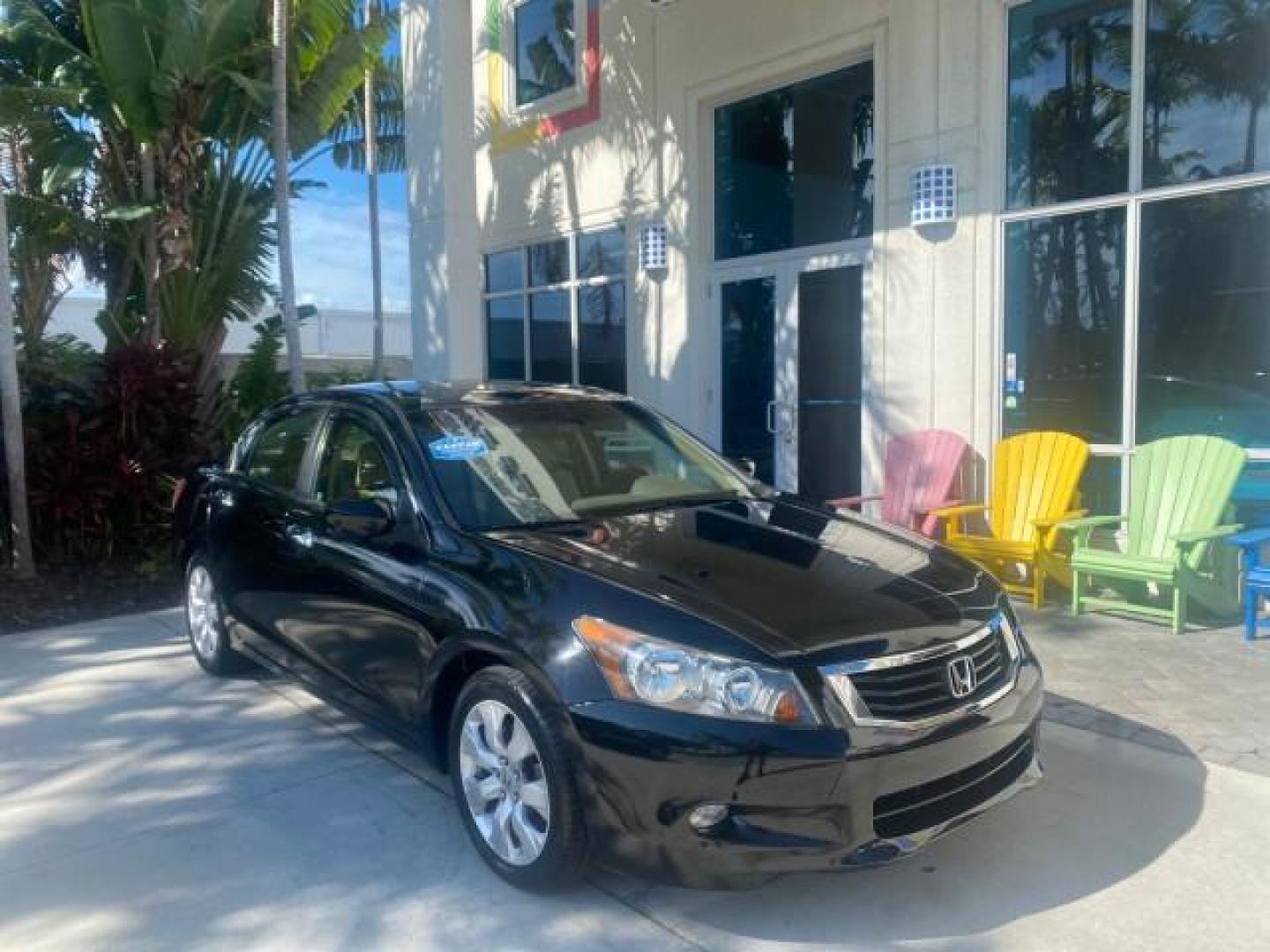 2010 Crystal Black Pearl /Ivory Honda Accord Sdn EX-L LOW MILES 68,158 (1HGCP3F8XAA) with an 3.5L SOHC MPFI 24-Valve i-VTEC V6 Engine engine, Automatic transmission, located at 4701 North Dixie Hwy, Pompano Beach, FL, 33064, (954) 422-2889, 26.240938, -80.123474 - OUR WEBPAGE FLORIDACARS1.COM HAS OVER 100 PHOTOS AND FREE CARFAX LINK 2010 HONDA ACCORD EX-L V6 VIN: 1HGCP3F8XAA027761 1 H G C P 3 F 8 X A A 0 2 7 7 6 1 SEDAN 4 DR 3.5L V6 F SOHC 24V GASOLINE FRONT WHEEL DRIVE Features ABS Brakes Air Conditioning Alloy Wheels AM/FM Stereo Automatic Transmission Auxi - Photo#1