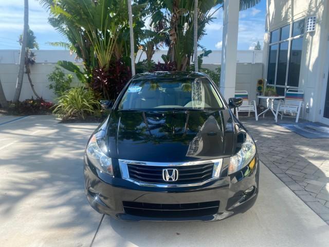 2010 Crystal Black Pearl /Ivory Honda Accord Sdn EX-L LOW MILES 68,167 (1HGCP3F8XAA) with an 3.5L SOHC MPFI 24-Valve i-VTEC V6 Engine engine, Automatic transmission, located at 4701 North Dixie Hwy, Pompano Beach, FL, 33064, (954) 422-2889, 26.240938, -80.123474 - OUR WEBPAGE FLORIDACARS1.COM HAS OVER 100 PHOTOS AND FREE CARFAX LINK 2010 HONDA ACCORD EX-L V6 VIN: 1HGCP3F8XAA027761 1 H G C P 3 F 8 X A A 0 2 7 7 6 1 SEDAN 4 DR 3.5L V6 F SOHC 24V GASOLINE FRONT WHEEL DRIVE Features ABS Brakes Air Conditioning Alloy Wheels AM/FM Stereo Automatic Transmission Auxi - Photo#2