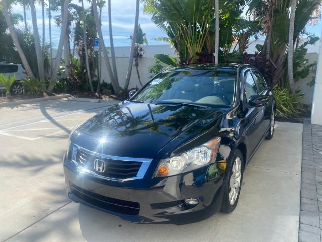 2010 Crystal Black Pearl /Ivory Honda Accord Sdn EX-L LOW MILES 68,167 (1HGCP3F8XAA) with an 3.5L SOHC MPFI 24-Valve i-VTEC V6 Engine engine, Automatic transmission, located at 4701 North Dixie Hwy, Pompano Beach, FL, 33064, (954) 422-2889, 26.240938, -80.123474 - OUR WEBPAGE FLORIDACARS1.COM HAS OVER 100 PHOTOS AND FREE CARFAX LINK 2010 HONDA ACCORD EX-L V6 VIN: 1HGCP3F8XAA027761 1 H G C P 3 F 8 X A A 0 2 7 7 6 1 SEDAN 4 DR 3.5L V6 F SOHC 24V GASOLINE FRONT WHEEL DRIVE Features ABS Brakes Air Conditioning Alloy Wheels AM/FM Stereo Automatic Transmission Auxi - Photo#3