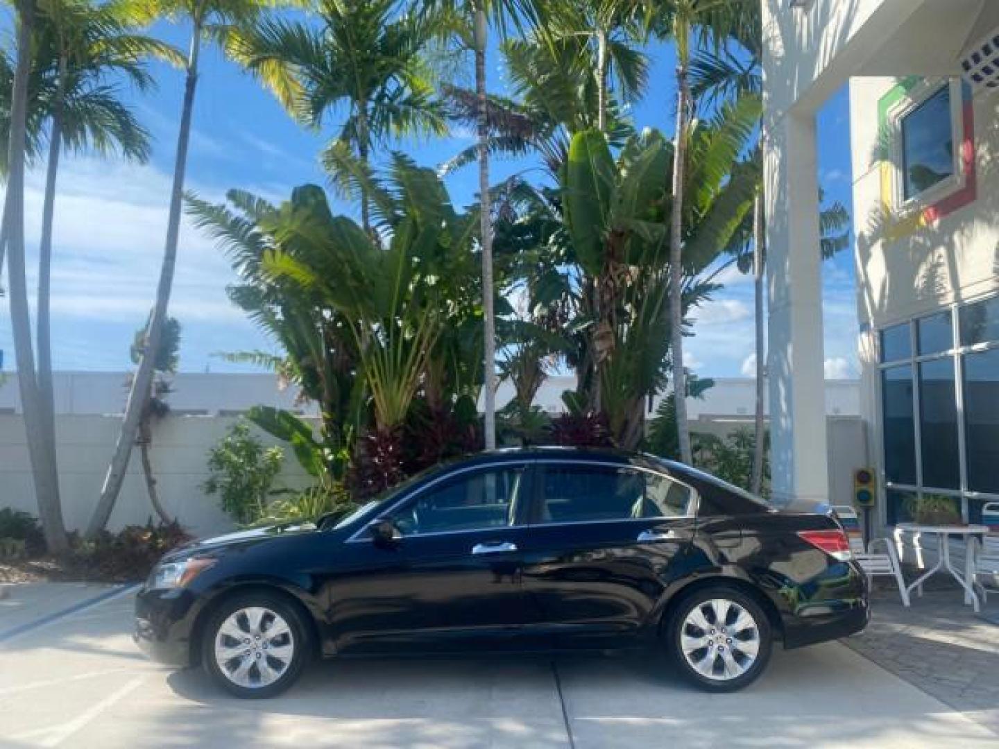 2010 Crystal Black Pearl /Ivory Honda Accord Sdn EX-L LOW MILES 68,158 (1HGCP3F8XAA) with an 3.5L SOHC MPFI 24-Valve i-VTEC V6 Engine engine, Automatic transmission, located at 4701 North Dixie Hwy, Pompano Beach, FL, 33064, (954) 422-2889, 26.240938, -80.123474 - OUR WEBPAGE FLORIDACARS1.COM HAS OVER 100 PHOTOS AND FREE CARFAX LINK 2010 HONDA ACCORD EX-L V6 VIN: 1HGCP3F8XAA027761 1 H G C P 3 F 8 X A A 0 2 7 7 6 1 SEDAN 4 DR 3.5L V6 F SOHC 24V GASOLINE FRONT WHEEL DRIVE Features ABS Brakes Air Conditioning Alloy Wheels AM/FM Stereo Automatic Transmission Auxi - Photo#4
