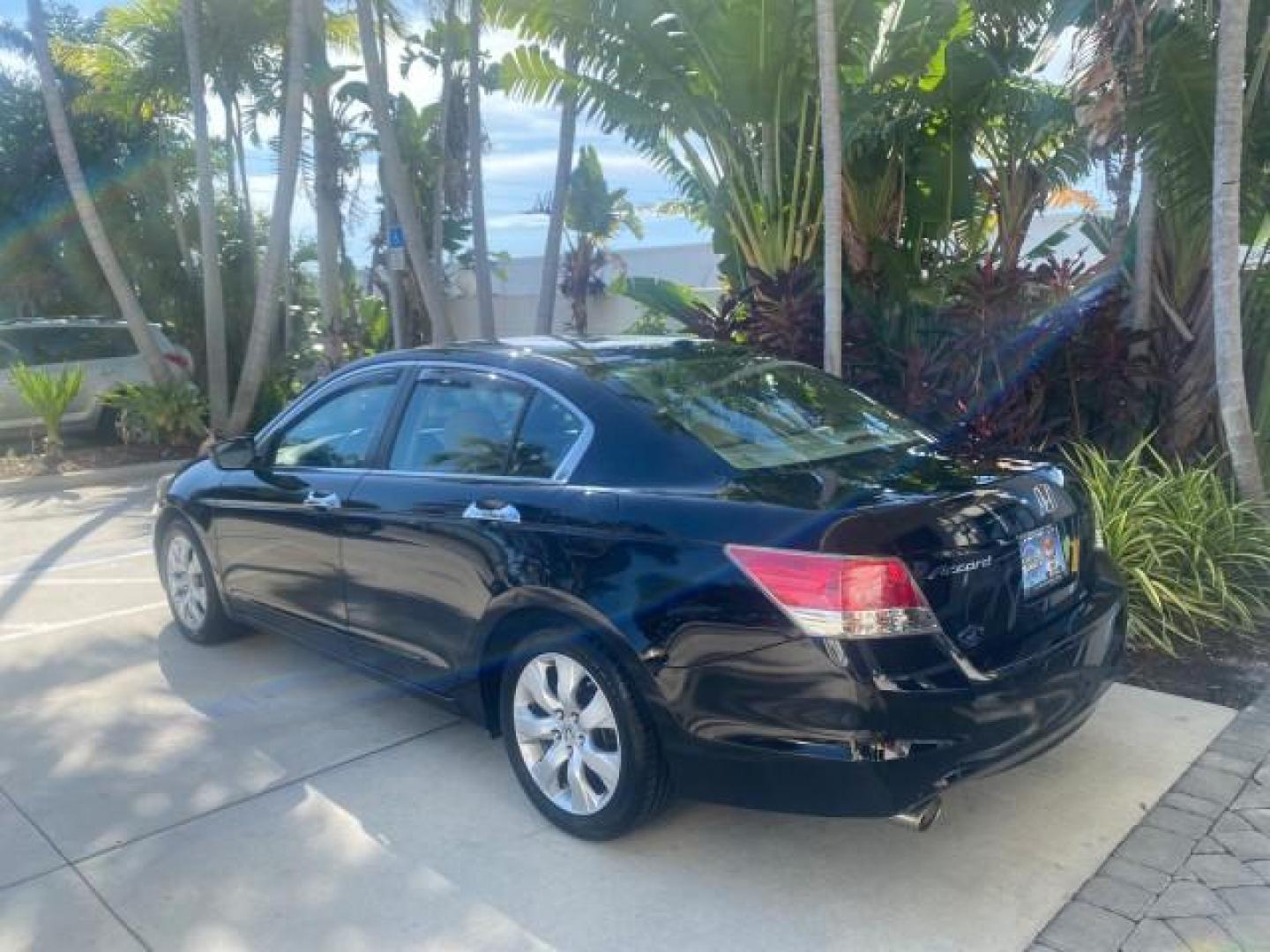 2010 Crystal Black Pearl /Ivory Honda Accord Sdn EX-L LOW MILES 68,158 (1HGCP3F8XAA) with an 3.5L SOHC MPFI 24-Valve i-VTEC V6 Engine engine, Automatic transmission, located at 4701 North Dixie Hwy, Pompano Beach, FL, 33064, (954) 422-2889, 26.240938, -80.123474 - OUR WEBPAGE FLORIDACARS1.COM HAS OVER 100 PHOTOS AND FREE CARFAX LINK 2010 HONDA ACCORD EX-L V6 VIN: 1HGCP3F8XAA027761 1 H G C P 3 F 8 X A A 0 2 7 7 6 1 SEDAN 4 DR 3.5L V6 F SOHC 24V GASOLINE FRONT WHEEL DRIVE Features ABS Brakes Air Conditioning Alloy Wheels AM/FM Stereo Automatic Transmission Auxi - Photo#5