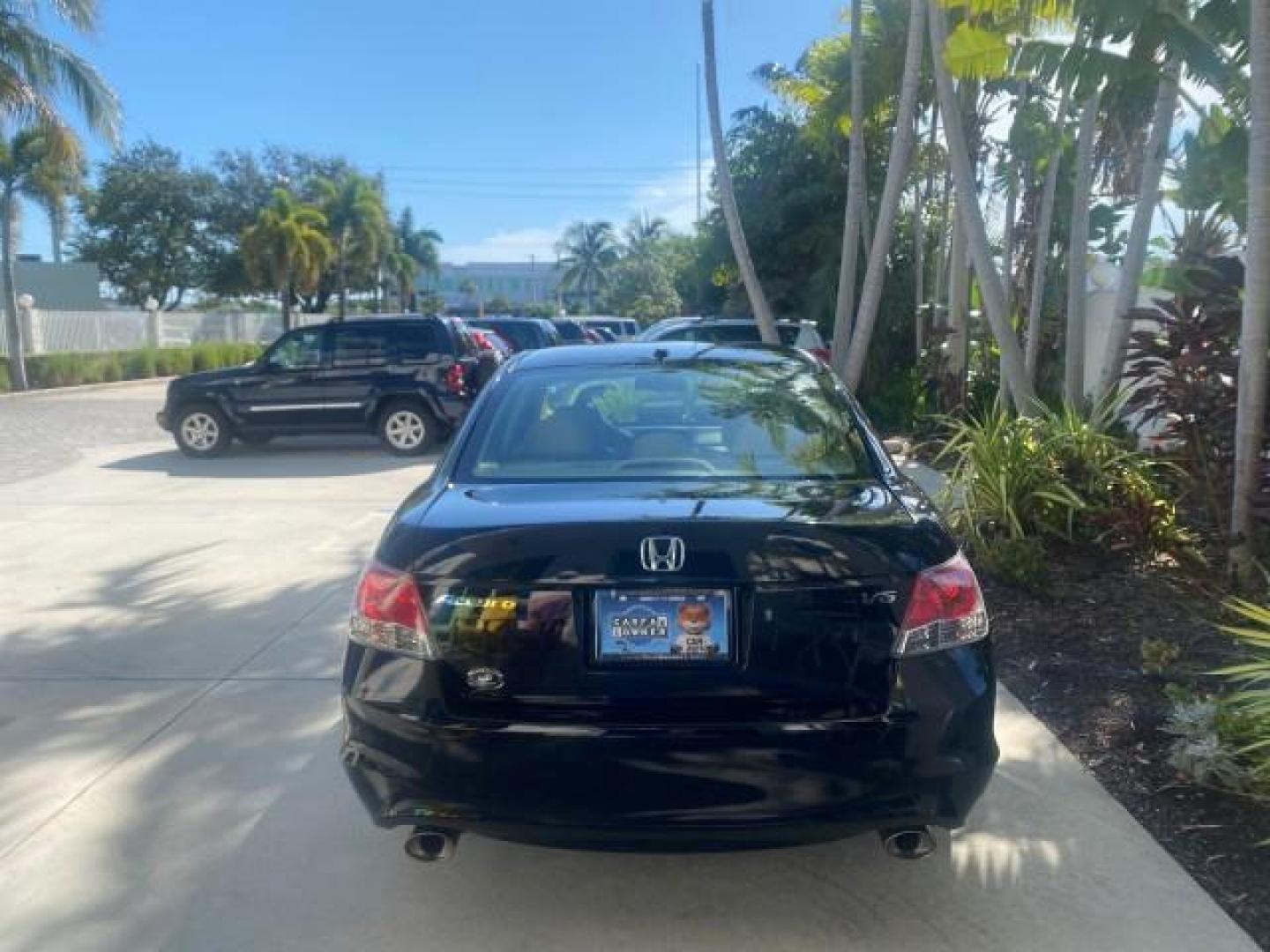 2010 Crystal Black Pearl /Ivory Honda Accord Sdn EX-L LOW MILES 68,158 (1HGCP3F8XAA) with an 3.5L SOHC MPFI 24-Valve i-VTEC V6 Engine engine, Automatic transmission, located at 4701 North Dixie Hwy, Pompano Beach, FL, 33064, (954) 422-2889, 26.240938, -80.123474 - OUR WEBPAGE FLORIDACARS1.COM HAS OVER 100 PHOTOS AND FREE CARFAX LINK 2010 HONDA ACCORD EX-L V6 VIN: 1HGCP3F8XAA027761 1 H G C P 3 F 8 X A A 0 2 7 7 6 1 SEDAN 4 DR 3.5L V6 F SOHC 24V GASOLINE FRONT WHEEL DRIVE Features ABS Brakes Air Conditioning Alloy Wheels AM/FM Stereo Automatic Transmission Auxi - Photo#6
