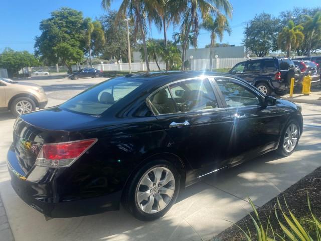 2010 Crystal Black Pearl /Ivory Honda Accord Sdn EX-L LOW MILES 68,167 (1HGCP3F8XAA) with an 3.5L SOHC MPFI 24-Valve i-VTEC V6 Engine engine, Automatic transmission, located at 4701 North Dixie Hwy, Pompano Beach, FL, 33064, (954) 422-2889, 26.240938, -80.123474 - OUR WEBPAGE FLORIDACARS1.COM HAS OVER 100 PHOTOS AND FREE CARFAX LINK 2010 HONDA ACCORD EX-L V6 VIN: 1HGCP3F8XAA027761 1 H G C P 3 F 8 X A A 0 2 7 7 6 1 SEDAN 4 DR 3.5L V6 F SOHC 24V GASOLINE FRONT WHEEL DRIVE Features ABS Brakes Air Conditioning Alloy Wheels AM/FM Stereo Automatic Transmission Auxi - Photo#7