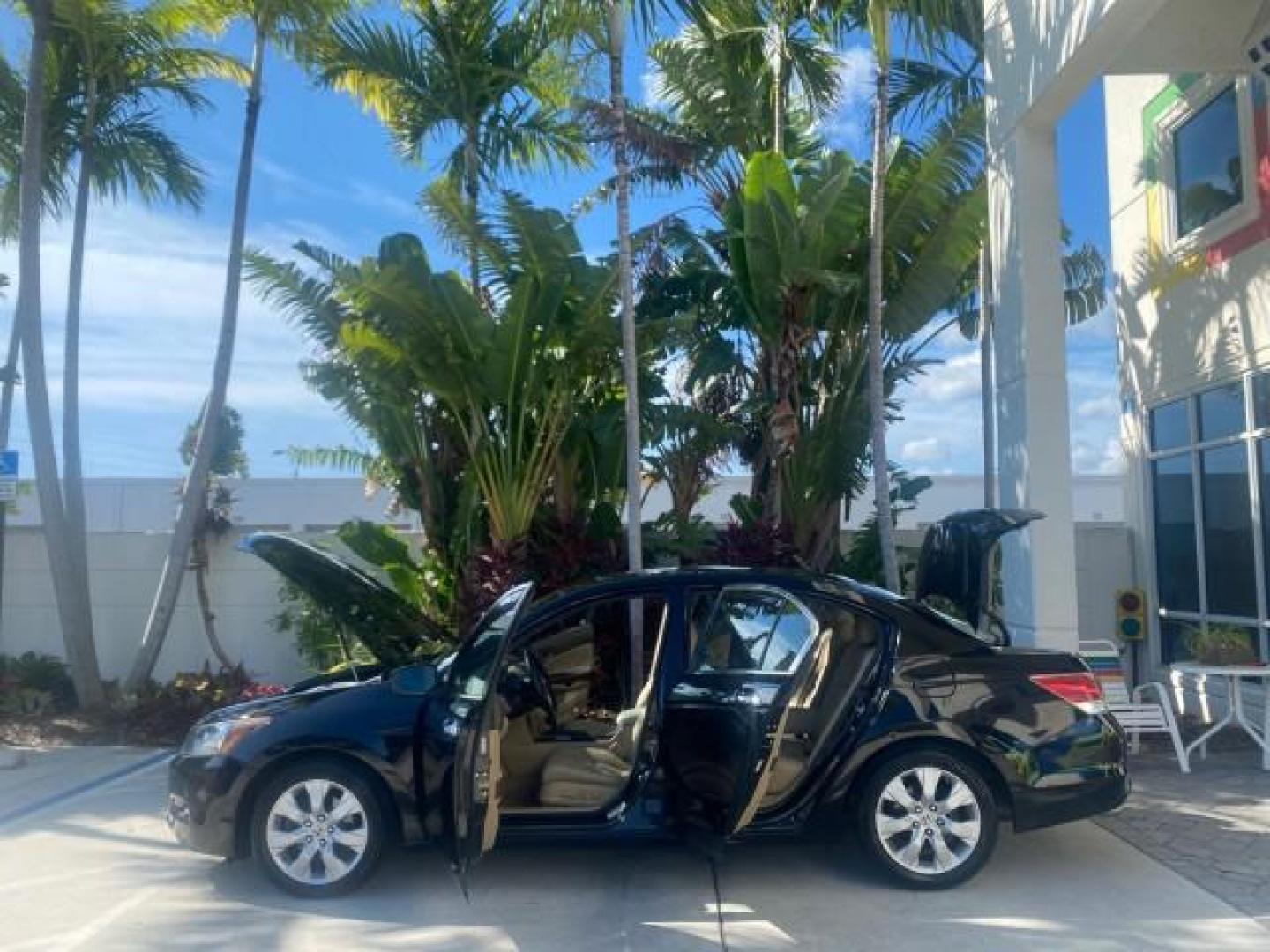 2010 Crystal Black Pearl /Ivory Honda Accord Sdn EX-L LOW MILES 68,158 (1HGCP3F8XAA) with an 3.5L SOHC MPFI 24-Valve i-VTEC V6 Engine engine, Automatic transmission, located at 4701 North Dixie Hwy, Pompano Beach, FL, 33064, (954) 422-2889, 26.240938, -80.123474 - OUR WEBPAGE FLORIDACARS1.COM HAS OVER 100 PHOTOS AND FREE CARFAX LINK 2010 HONDA ACCORD EX-L V6 VIN: 1HGCP3F8XAA027761 1 H G C P 3 F 8 X A A 0 2 7 7 6 1 SEDAN 4 DR 3.5L V6 F SOHC 24V GASOLINE FRONT WHEEL DRIVE Features ABS Brakes Air Conditioning Alloy Wheels AM/FM Stereo Automatic Transmission Auxi - Photo#8