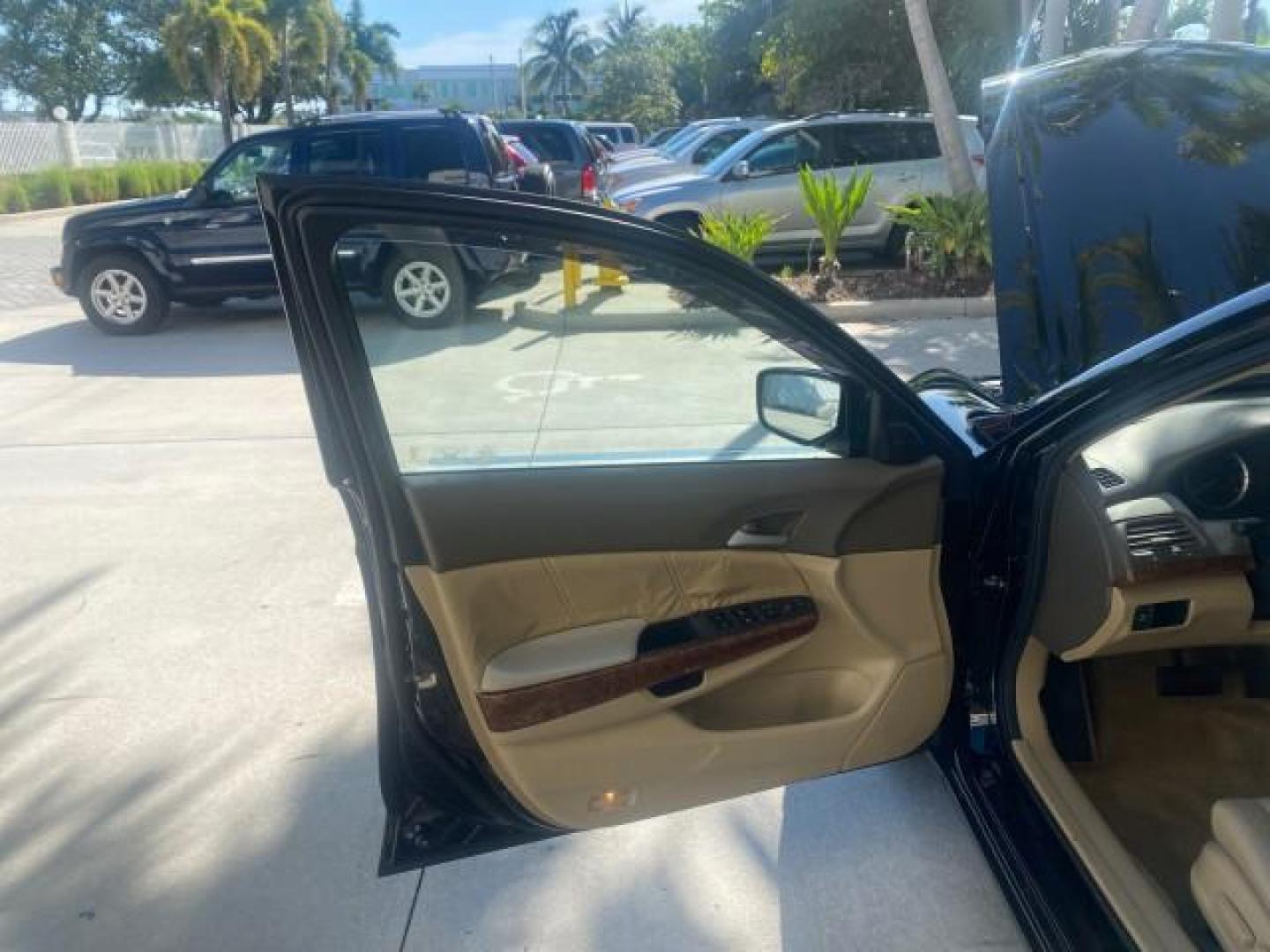 2010 Crystal Black Pearl /Ivory Honda Accord Sdn EX-L LOW MILES 68,158 (1HGCP3F8XAA) with an 3.5L SOHC MPFI 24-Valve i-VTEC V6 Engine engine, Automatic transmission, located at 4701 North Dixie Hwy, Pompano Beach, FL, 33064, (954) 422-2889, 26.240938, -80.123474 - OUR WEBPAGE FLORIDACARS1.COM HAS OVER 100 PHOTOS AND FREE CARFAX LINK 2010 HONDA ACCORD EX-L V6 VIN: 1HGCP3F8XAA027761 1 H G C P 3 F 8 X A A 0 2 7 7 6 1 SEDAN 4 DR 3.5L V6 F SOHC 24V GASOLINE FRONT WHEEL DRIVE Features ABS Brakes Air Conditioning Alloy Wheels AM/FM Stereo Automatic Transmission Auxi - Photo#9
