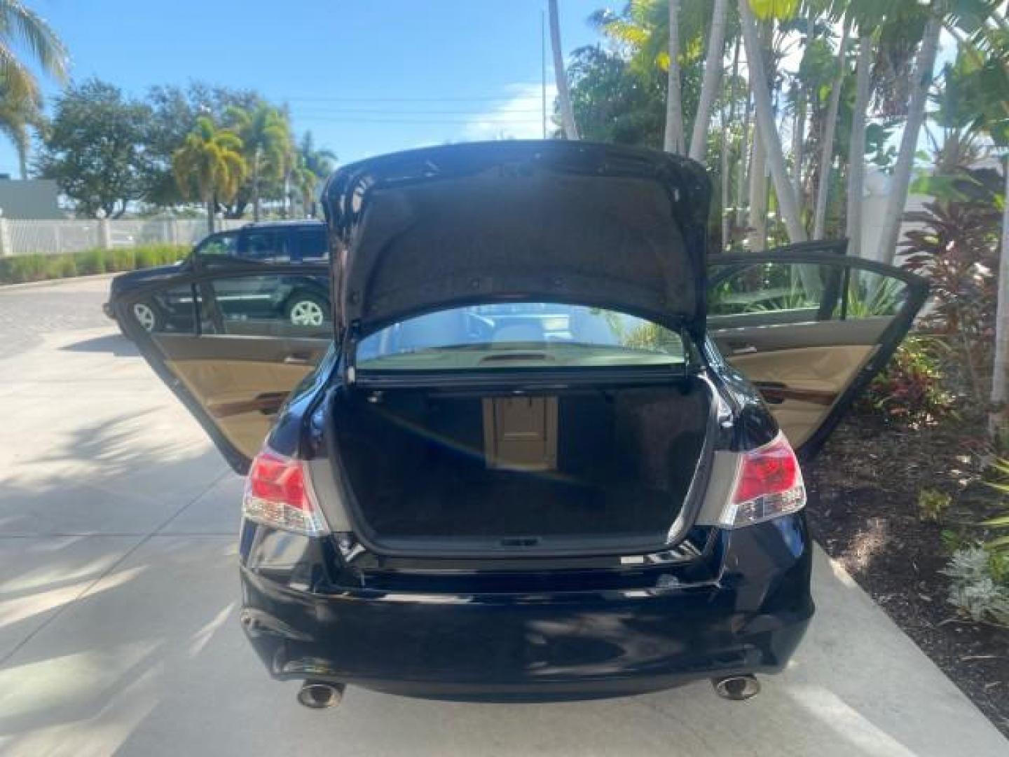 2010 Crystal Black Pearl /Ivory Honda Accord Sdn EX-L LOW MILES 68,158 (1HGCP3F8XAA) with an 3.5L SOHC MPFI 24-Valve i-VTEC V6 Engine engine, Automatic transmission, located at 4701 North Dixie Hwy, Pompano Beach, FL, 33064, (954) 422-2889, 26.240938, -80.123474 - OUR WEBPAGE FLORIDACARS1.COM HAS OVER 100 PHOTOS AND FREE CARFAX LINK 2010 HONDA ACCORD EX-L V6 VIN: 1HGCP3F8XAA027761 1 H G C P 3 F 8 X A A 0 2 7 7 6 1 SEDAN 4 DR 3.5L V6 F SOHC 24V GASOLINE FRONT WHEEL DRIVE Features ABS Brakes Air Conditioning Alloy Wheels AM/FM Stereo Automatic Transmission Auxi - Photo#15