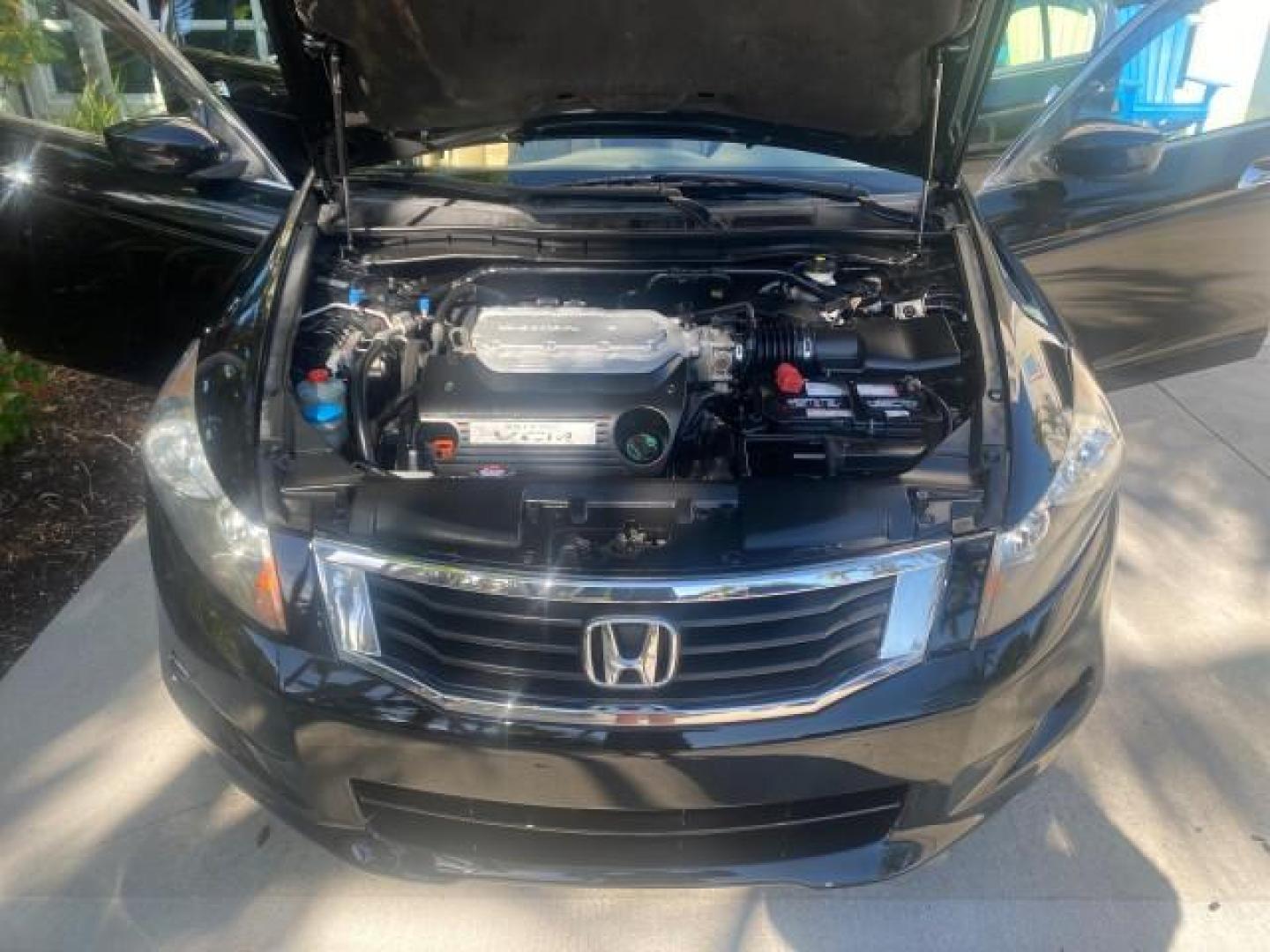 2010 Crystal Black Pearl /Ivory Honda Accord Sdn EX-L LOW MILES 68,158 (1HGCP3F8XAA) with an 3.5L SOHC MPFI 24-Valve i-VTEC V6 Engine engine, Automatic transmission, located at 4701 North Dixie Hwy, Pompano Beach, FL, 33064, (954) 422-2889, 26.240938, -80.123474 - OUR WEBPAGE FLORIDACARS1.COM HAS OVER 100 PHOTOS AND FREE CARFAX LINK 2010 HONDA ACCORD EX-L V6 VIN: 1HGCP3F8XAA027761 1 H G C P 3 F 8 X A A 0 2 7 7 6 1 SEDAN 4 DR 3.5L V6 F SOHC 24V GASOLINE FRONT WHEEL DRIVE Features ABS Brakes Air Conditioning Alloy Wheels AM/FM Stereo Automatic Transmission Auxi - Photo#17