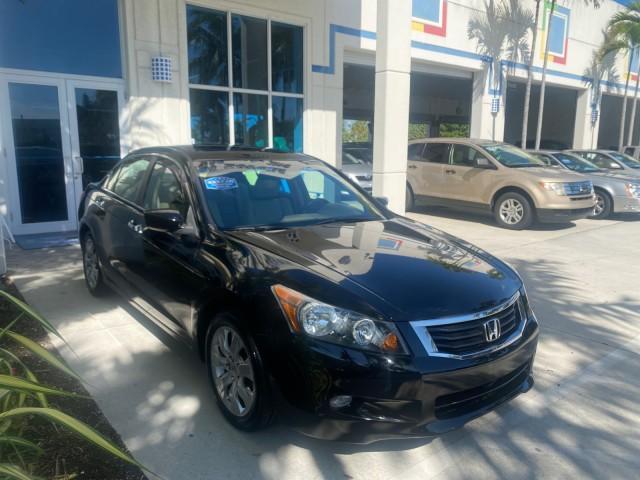 2010 Crystal Black Pearl /Ivory Honda Accord Sdn EX-L LOW MILES 68,167 (1HGCP3F8XAA) with an 3.5L SOHC MPFI 24-Valve i-VTEC V6 Engine engine, Automatic transmission, located at 4701 North Dixie Hwy, Pompano Beach, FL, 33064, (954) 422-2889, 26.240938, -80.123474 - OUR WEBPAGE FLORIDACARS1.COM HAS OVER 100 PHOTOS AND FREE CARFAX LINK 2010 HONDA ACCORD EX-L V6 VIN: 1HGCP3F8XAA027761 1 H G C P 3 F 8 X A A 0 2 7 7 6 1 SEDAN 4 DR 3.5L V6 F SOHC 24V GASOLINE FRONT WHEEL DRIVE Features ABS Brakes Air Conditioning Alloy Wheels AM/FM Stereo Automatic Transmission Auxi - Photo#24