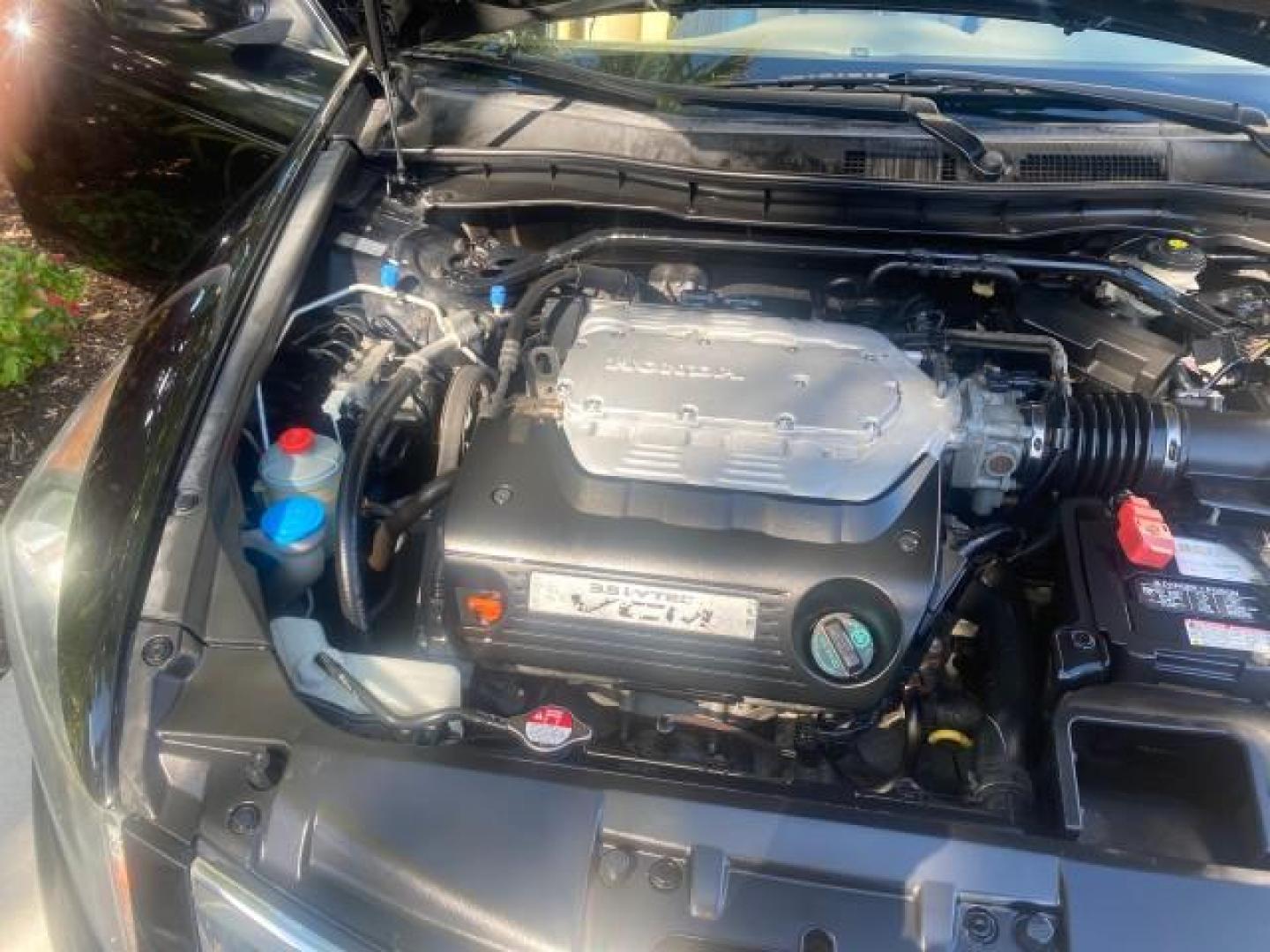 2010 Crystal Black Pearl /Ivory Honda Accord Sdn EX-L LOW MILES 68,158 (1HGCP3F8XAA) with an 3.5L SOHC MPFI 24-Valve i-VTEC V6 Engine engine, Automatic transmission, located at 4701 North Dixie Hwy, Pompano Beach, FL, 33064, (954) 422-2889, 26.240938, -80.123474 - OUR WEBPAGE FLORIDACARS1.COM HAS OVER 100 PHOTOS AND FREE CARFAX LINK 2010 HONDA ACCORD EX-L V6 VIN: 1HGCP3F8XAA027761 1 H G C P 3 F 8 X A A 0 2 7 7 6 1 SEDAN 4 DR 3.5L V6 F SOHC 24V GASOLINE FRONT WHEEL DRIVE Features ABS Brakes Air Conditioning Alloy Wheels AM/FM Stereo Automatic Transmission Auxi - Photo#25