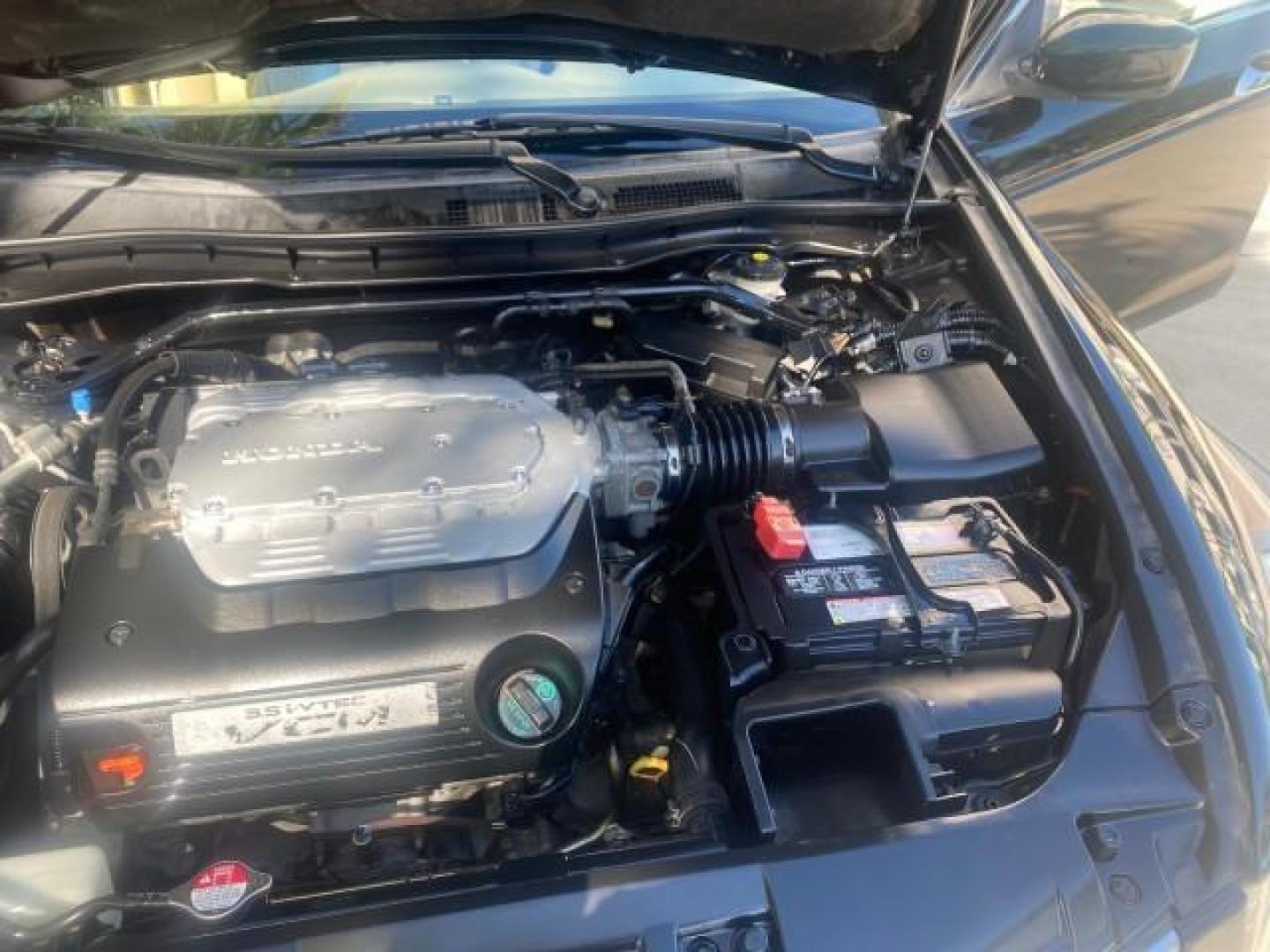 2010 Crystal Black Pearl /Ivory Honda Accord Sdn EX-L LOW MILES 68,158 (1HGCP3F8XAA) with an 3.5L SOHC MPFI 24-Valve i-VTEC V6 Engine engine, Automatic transmission, located at 4701 North Dixie Hwy, Pompano Beach, FL, 33064, (954) 422-2889, 26.240938, -80.123474 - OUR WEBPAGE FLORIDACARS1.COM HAS OVER 100 PHOTOS AND FREE CARFAX LINK 2010 HONDA ACCORD EX-L V6 VIN: 1HGCP3F8XAA027761 1 H G C P 3 F 8 X A A 0 2 7 7 6 1 SEDAN 4 DR 3.5L V6 F SOHC 24V GASOLINE FRONT WHEEL DRIVE Features ABS Brakes Air Conditioning Alloy Wheels AM/FM Stereo Automatic Transmission Auxi - Photo#26