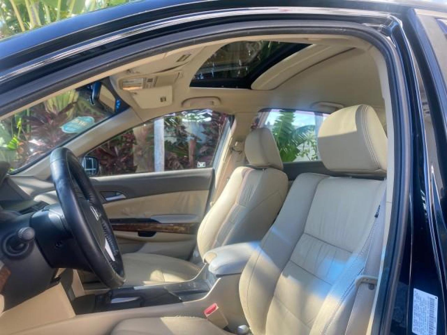 2010 Crystal Black Pearl /Ivory Honda Accord Sdn EX-L LOW MILES 68,158 (1HGCP3F8XAA) with an 3.5L SOHC MPFI 24-Valve i-VTEC V6 Engine engine, Automatic transmission, located at 4701 North Dixie Hwy, Pompano Beach, FL, 33064, (954) 422-2889, 26.240938, -80.123474 - OUR WEBPAGE FLORIDACARS1.COM HAS OVER 100 PHOTOS AND FREE CARFAX LINK 2010 HONDA ACCORD EX-L V6 VIN: 1HGCP3F8XAA027761 1 H G C P 3 F 8 X A A 0 2 7 7 6 1 SEDAN 4 DR 3.5L V6 F SOHC 24V GASOLINE FRONT WHEEL DRIVE Features ABS Brakes Air Conditioning Alloy Wheels AM/FM Stereo Automatic Transmission Auxi - Photo#33