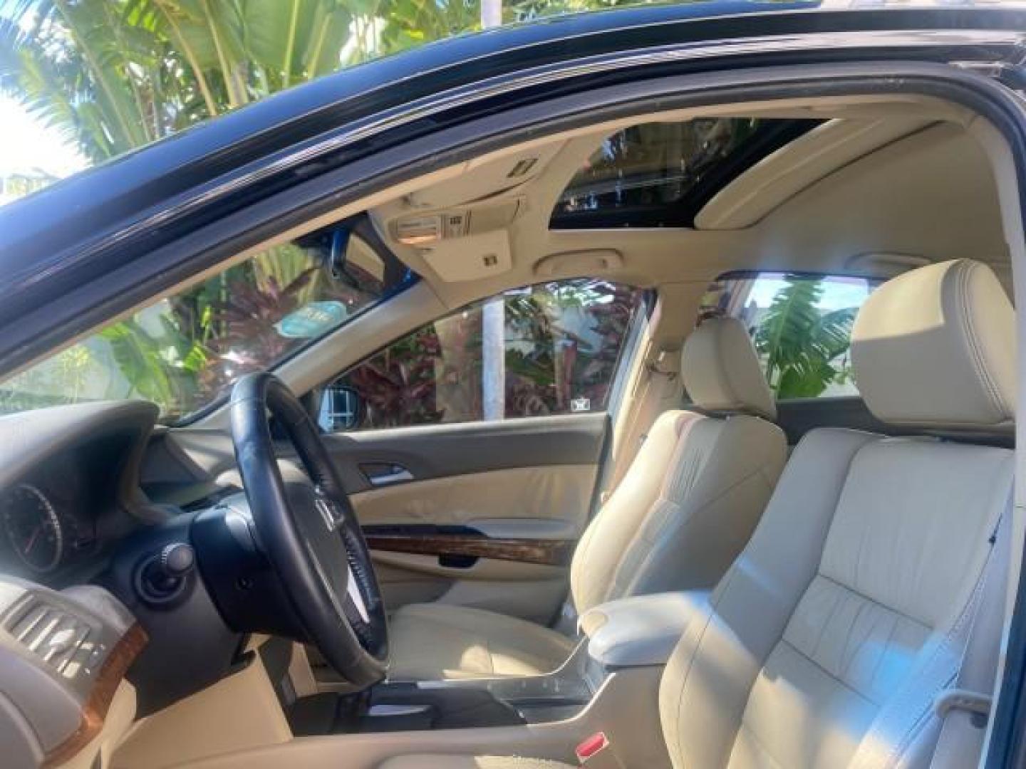 2010 Crystal Black Pearl /Ivory Honda Accord Sdn EX-L LOW MILES 68,158 (1HGCP3F8XAA) with an 3.5L SOHC MPFI 24-Valve i-VTEC V6 Engine engine, Automatic transmission, located at 4701 North Dixie Hwy, Pompano Beach, FL, 33064, (954) 422-2889, 26.240938, -80.123474 - OUR WEBPAGE FLORIDACARS1.COM HAS OVER 100 PHOTOS AND FREE CARFAX LINK 2010 HONDA ACCORD EX-L V6 VIN: 1HGCP3F8XAA027761 1 H G C P 3 F 8 X A A 0 2 7 7 6 1 SEDAN 4 DR 3.5L V6 F SOHC 24V GASOLINE FRONT WHEEL DRIVE Features ABS Brakes Air Conditioning Alloy Wheels AM/FM Stereo Automatic Transmission Auxi - Photo#34