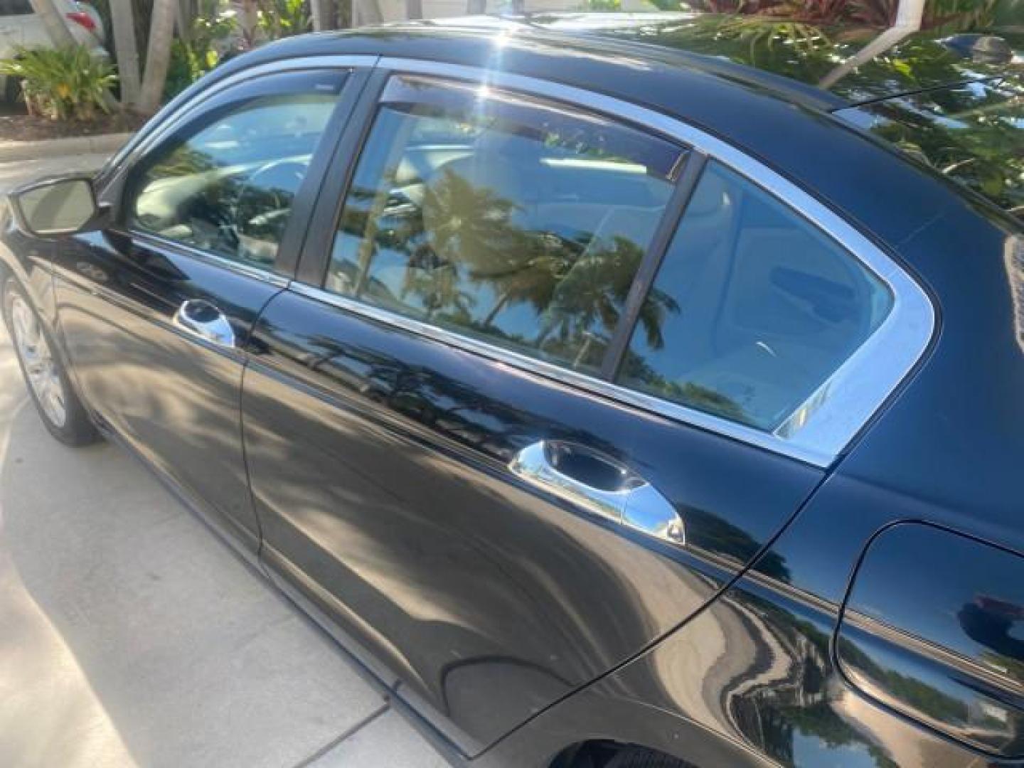 2010 Crystal Black Pearl /Ivory Honda Accord Sdn EX-L LOW MILES 68,158 (1HGCP3F8XAA) with an 3.5L SOHC MPFI 24-Valve i-VTEC V6 Engine engine, Automatic transmission, located at 4701 North Dixie Hwy, Pompano Beach, FL, 33064, (954) 422-2889, 26.240938, -80.123474 - OUR WEBPAGE FLORIDACARS1.COM HAS OVER 100 PHOTOS AND FREE CARFAX LINK 2010 HONDA ACCORD EX-L V6 VIN: 1HGCP3F8XAA027761 1 H G C P 3 F 8 X A A 0 2 7 7 6 1 SEDAN 4 DR 3.5L V6 F SOHC 24V GASOLINE FRONT WHEEL DRIVE Features ABS Brakes Air Conditioning Alloy Wheels AM/FM Stereo Automatic Transmission Auxi - Photo#63