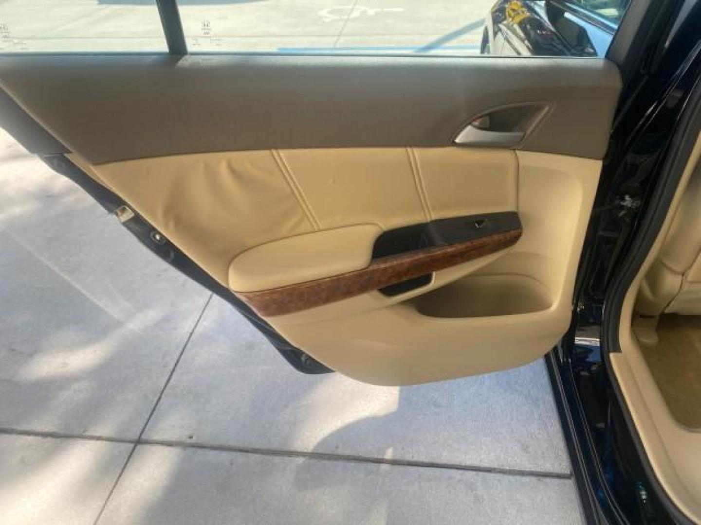 2010 Crystal Black Pearl /Ivory Honda Accord Sdn EX-L LOW MILES 68,158 (1HGCP3F8XAA) with an 3.5L SOHC MPFI 24-Valve i-VTEC V6 Engine engine, Automatic transmission, located at 4701 North Dixie Hwy, Pompano Beach, FL, 33064, (954) 422-2889, 26.240938, -80.123474 - OUR WEBPAGE FLORIDACARS1.COM HAS OVER 100 PHOTOS AND FREE CARFAX LINK 2010 HONDA ACCORD EX-L V6 VIN: 1HGCP3F8XAA027761 1 H G C P 3 F 8 X A A 0 2 7 7 6 1 SEDAN 4 DR 3.5L V6 F SOHC 24V GASOLINE FRONT WHEEL DRIVE Features ABS Brakes Air Conditioning Alloy Wheels AM/FM Stereo Automatic Transmission Auxi - Photo#65