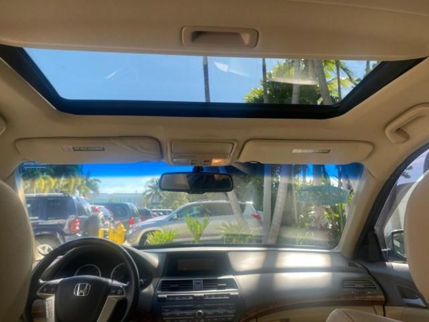 2010 Crystal Black Pearl /Ivory Honda Accord Sdn EX-L LOW MILES 68,158 (1HGCP3F8XAA) with an 3.5L SOHC MPFI 24-Valve i-VTEC V6 Engine engine, Automatic transmission, located at 4701 North Dixie Hwy, Pompano Beach, FL, 33064, (954) 422-2889, 26.240938, -80.123474 - OUR WEBPAGE FLORIDACARS1.COM HAS OVER 100 PHOTOS AND FREE CARFAX LINK 2010 HONDA ACCORD EX-L V6 VIN: 1HGCP3F8XAA027761 1 H G C P 3 F 8 X A A 0 2 7 7 6 1 SEDAN 4 DR 3.5L V6 F SOHC 24V GASOLINE FRONT WHEEL DRIVE Features ABS Brakes Air Conditioning Alloy Wheels AM/FM Stereo Automatic Transmission Auxi - Photo#73