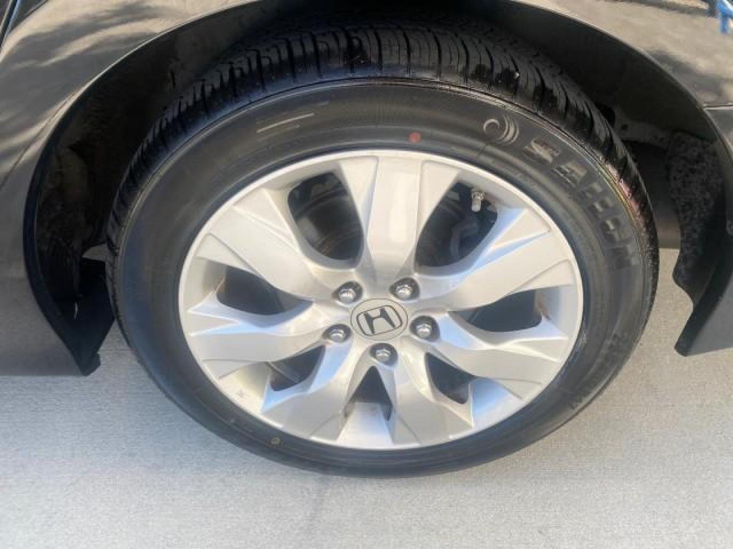2010 Crystal Black Pearl /Ivory Honda Accord Sdn EX-L LOW MILES 68,158 (1HGCP3F8XAA) with an 3.5L SOHC MPFI 24-Valve i-VTEC V6 Engine engine, Automatic transmission, located at 4701 North Dixie Hwy, Pompano Beach, FL, 33064, (954) 422-2889, 26.240938, -80.123474 - OUR WEBPAGE FLORIDACARS1.COM HAS OVER 100 PHOTOS AND FREE CARFAX LINK 2010 HONDA ACCORD EX-L V6 VIN: 1HGCP3F8XAA027761 1 H G C P 3 F 8 X A A 0 2 7 7 6 1 SEDAN 4 DR 3.5L V6 F SOHC 24V GASOLINE FRONT WHEEL DRIVE Features ABS Brakes Air Conditioning Alloy Wheels AM/FM Stereo Automatic Transmission Auxi - Photo#77