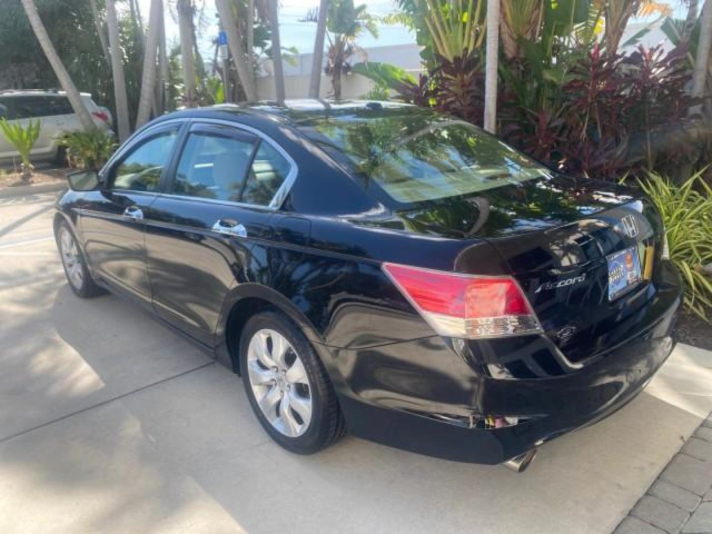 2010 Crystal Black Pearl /Ivory Honda Accord Sdn EX-L LOW MILES 68,158 (1HGCP3F8XAA) with an 3.5L SOHC MPFI 24-Valve i-VTEC V6 Engine engine, Automatic transmission, located at 4701 North Dixie Hwy, Pompano Beach, FL, 33064, (954) 422-2889, 26.240938, -80.123474 - OUR WEBPAGE FLORIDACARS1.COM HAS OVER 100 PHOTOS AND FREE CARFAX LINK 2010 HONDA ACCORD EX-L V6 VIN: 1HGCP3F8XAA027761 1 H G C P 3 F 8 X A A 0 2 7 7 6 1 SEDAN 4 DR 3.5L V6 F SOHC 24V GASOLINE FRONT WHEEL DRIVE Features ABS Brakes Air Conditioning Alloy Wheels AM/FM Stereo Automatic Transmission Auxi - Photo#79