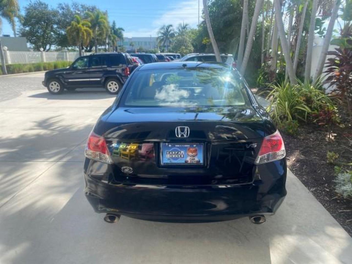 2010 Crystal Black Pearl /Ivory Honda Accord Sdn EX-L LOW MILES 68,158 (1HGCP3F8XAA) with an 3.5L SOHC MPFI 24-Valve i-VTEC V6 Engine engine, Automatic transmission, located at 4701 North Dixie Hwy, Pompano Beach, FL, 33064, (954) 422-2889, 26.240938, -80.123474 - OUR WEBPAGE FLORIDACARS1.COM HAS OVER 100 PHOTOS AND FREE CARFAX LINK 2010 HONDA ACCORD EX-L V6 VIN: 1HGCP3F8XAA027761 1 H G C P 3 F 8 X A A 0 2 7 7 6 1 SEDAN 4 DR 3.5L V6 F SOHC 24V GASOLINE FRONT WHEEL DRIVE Features ABS Brakes Air Conditioning Alloy Wheels AM/FM Stereo Automatic Transmission Auxi - Photo#80
