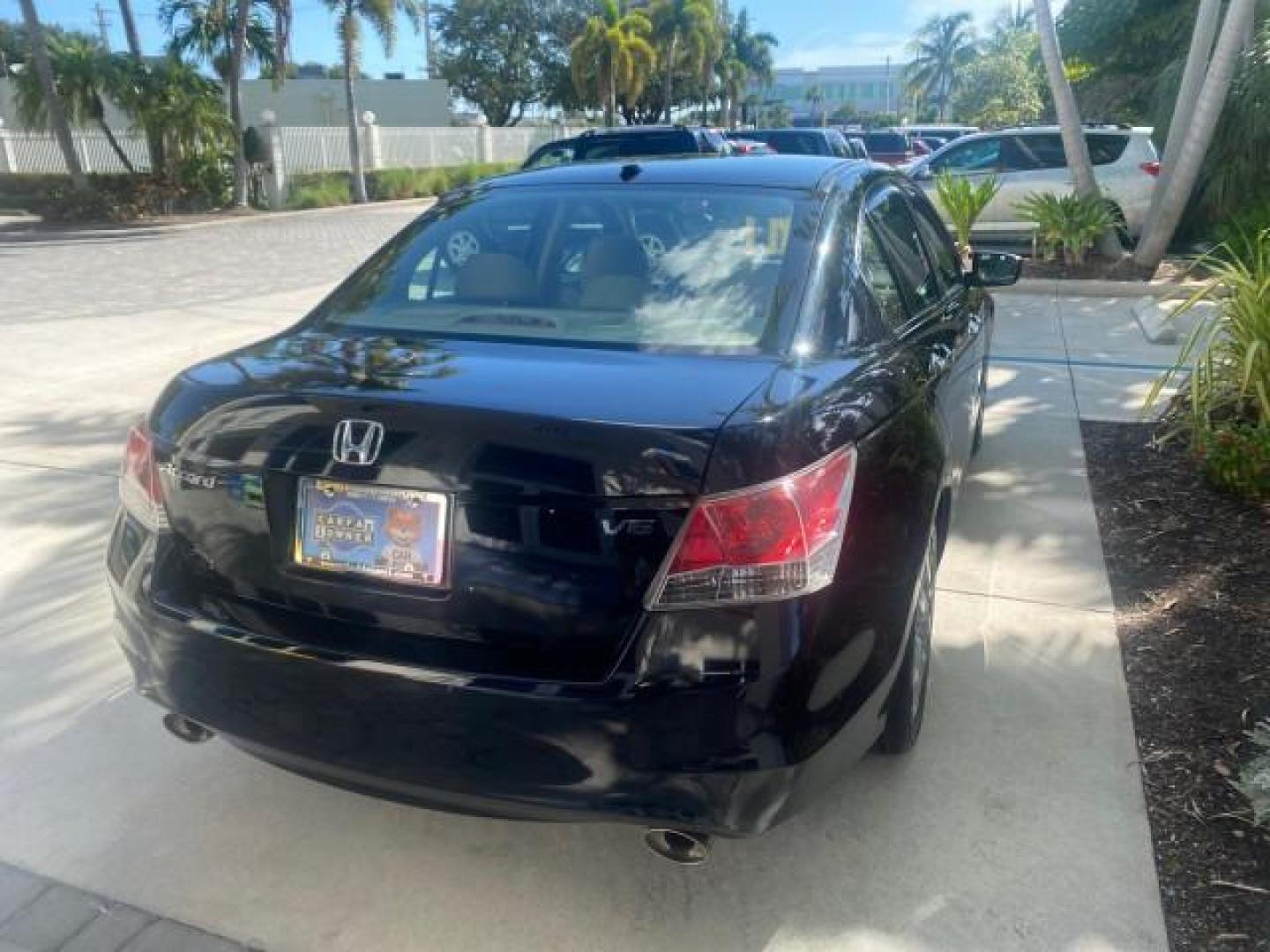 2010 Crystal Black Pearl /Ivory Honda Accord Sdn EX-L LOW MILES 68,158 (1HGCP3F8XAA) with an 3.5L SOHC MPFI 24-Valve i-VTEC V6 Engine engine, Automatic transmission, located at 4701 North Dixie Hwy, Pompano Beach, FL, 33064, (954) 422-2889, 26.240938, -80.123474 - OUR WEBPAGE FLORIDACARS1.COM HAS OVER 100 PHOTOS AND FREE CARFAX LINK 2010 HONDA ACCORD EX-L V6 VIN: 1HGCP3F8XAA027761 1 H G C P 3 F 8 X A A 0 2 7 7 6 1 SEDAN 4 DR 3.5L V6 F SOHC 24V GASOLINE FRONT WHEEL DRIVE Features ABS Brakes Air Conditioning Alloy Wheels AM/FM Stereo Automatic Transmission Auxi - Photo#81
