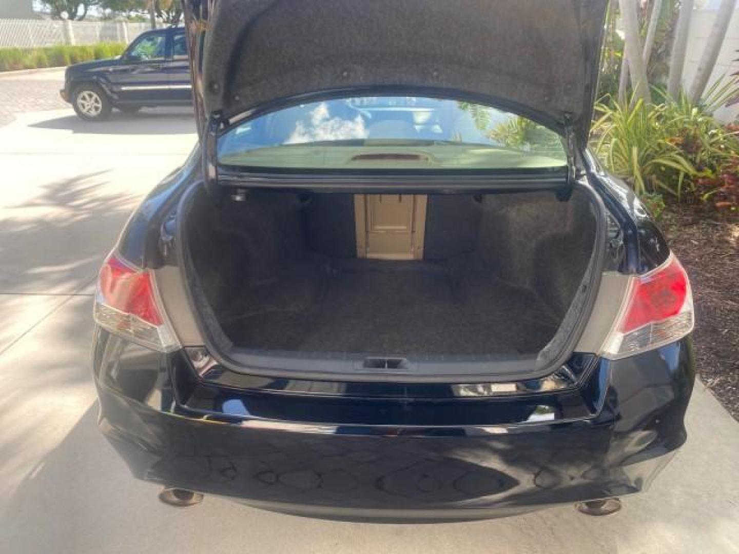 2010 Crystal Black Pearl /Ivory Honda Accord Sdn EX-L LOW MILES 68,158 (1HGCP3F8XAA) with an 3.5L SOHC MPFI 24-Valve i-VTEC V6 Engine engine, Automatic transmission, located at 4701 North Dixie Hwy, Pompano Beach, FL, 33064, (954) 422-2889, 26.240938, -80.123474 - OUR WEBPAGE FLORIDACARS1.COM HAS OVER 100 PHOTOS AND FREE CARFAX LINK 2010 HONDA ACCORD EX-L V6 VIN: 1HGCP3F8XAA027761 1 H G C P 3 F 8 X A A 0 2 7 7 6 1 SEDAN 4 DR 3.5L V6 F SOHC 24V GASOLINE FRONT WHEEL DRIVE Features ABS Brakes Air Conditioning Alloy Wheels AM/FM Stereo Automatic Transmission Auxi - Photo#86