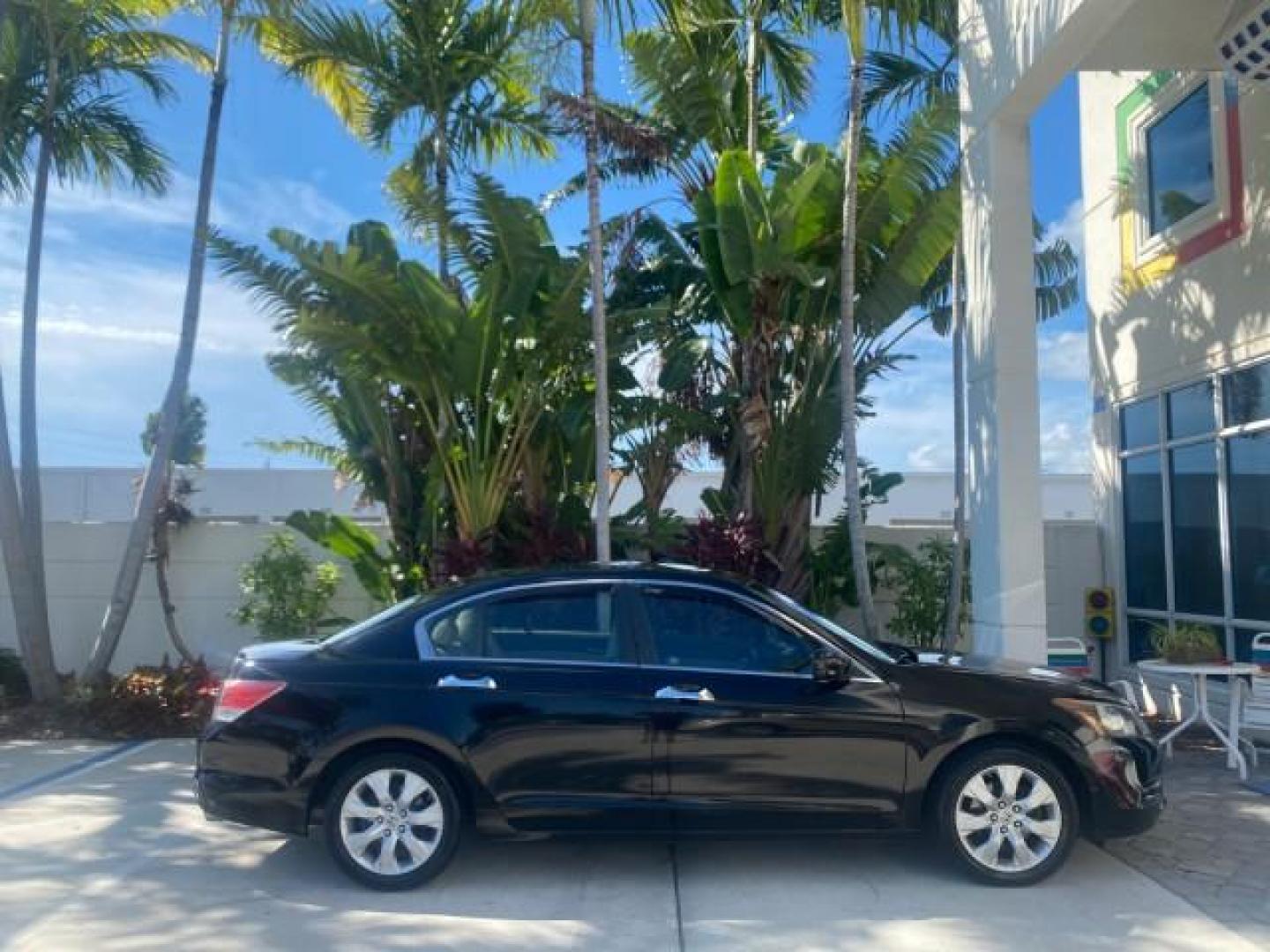 2010 Crystal Black Pearl /Ivory Honda Accord Sdn EX-L LOW MILES 68,158 (1HGCP3F8XAA) with an 3.5L SOHC MPFI 24-Valve i-VTEC V6 Engine engine, Automatic transmission, located at 4701 North Dixie Hwy, Pompano Beach, FL, 33064, (954) 422-2889, 26.240938, -80.123474 - OUR WEBPAGE FLORIDACARS1.COM HAS OVER 100 PHOTOS AND FREE CARFAX LINK 2010 HONDA ACCORD EX-L V6 VIN: 1HGCP3F8XAA027761 1 H G C P 3 F 8 X A A 0 2 7 7 6 1 SEDAN 4 DR 3.5L V6 F SOHC 24V GASOLINE FRONT WHEEL DRIVE Features ABS Brakes Air Conditioning Alloy Wheels AM/FM Stereo Automatic Transmission Auxi - Photo#89
