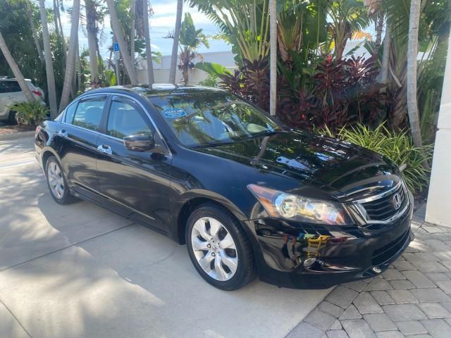 2010 Crystal Black Pearl /Ivory Honda Accord Sdn EX-L LOW MILES 68,167 (1HGCP3F8XAA) with an 3.5L SOHC MPFI 24-Valve i-VTEC V6 Engine engine, Automatic transmission, located at 4701 North Dixie Hwy, Pompano Beach, FL, 33064, (954) 422-2889, 26.240938, -80.123474 - OUR WEBPAGE FLORIDACARS1.COM HAS OVER 100 PHOTOS AND FREE CARFAX LINK 2010 HONDA ACCORD EX-L V6 VIN: 1HGCP3F8XAA027761 1 H G C P 3 F 8 X A A 0 2 7 7 6 1 SEDAN 4 DR 3.5L V6 F SOHC 24V GASOLINE FRONT WHEEL DRIVE Features ABS Brakes Air Conditioning Alloy Wheels AM/FM Stereo Automatic Transmission Auxi - Photo#90