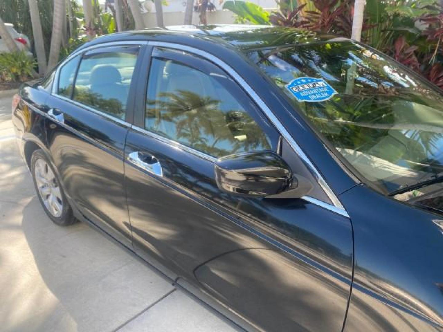 2010 Crystal Black Pearl /Ivory Honda Accord Sdn EX-L LOW MILES 68,158 (1HGCP3F8XAA) with an 3.5L SOHC MPFI 24-Valve i-VTEC V6 Engine engine, Automatic transmission, located at 4701 North Dixie Hwy, Pompano Beach, FL, 33064, (954) 422-2889, 26.240938, -80.123474 - OUR WEBPAGE FLORIDACARS1.COM HAS OVER 100 PHOTOS AND FREE CARFAX LINK 2010 HONDA ACCORD EX-L V6 VIN: 1HGCP3F8XAA027761 1 H G C P 3 F 8 X A A 0 2 7 7 6 1 SEDAN 4 DR 3.5L V6 F SOHC 24V GASOLINE FRONT WHEEL DRIVE Features ABS Brakes Air Conditioning Alloy Wheels AM/FM Stereo Automatic Transmission Auxi - Photo#93