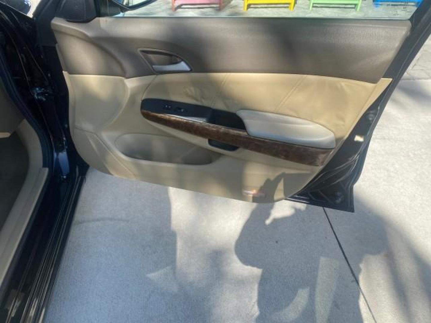 2010 Crystal Black Pearl /Ivory Honda Accord Sdn EX-L LOW MILES 68,158 (1HGCP3F8XAA) with an 3.5L SOHC MPFI 24-Valve i-VTEC V6 Engine engine, Automatic transmission, located at 4701 North Dixie Hwy, Pompano Beach, FL, 33064, (954) 422-2889, 26.240938, -80.123474 - OUR WEBPAGE FLORIDACARS1.COM HAS OVER 100 PHOTOS AND FREE CARFAX LINK 2010 HONDA ACCORD EX-L V6 VIN: 1HGCP3F8XAA027761 1 H G C P 3 F 8 X A A 0 2 7 7 6 1 SEDAN 4 DR 3.5L V6 F SOHC 24V GASOLINE FRONT WHEEL DRIVE Features ABS Brakes Air Conditioning Alloy Wheels AM/FM Stereo Automatic Transmission Auxi - Photo#97
