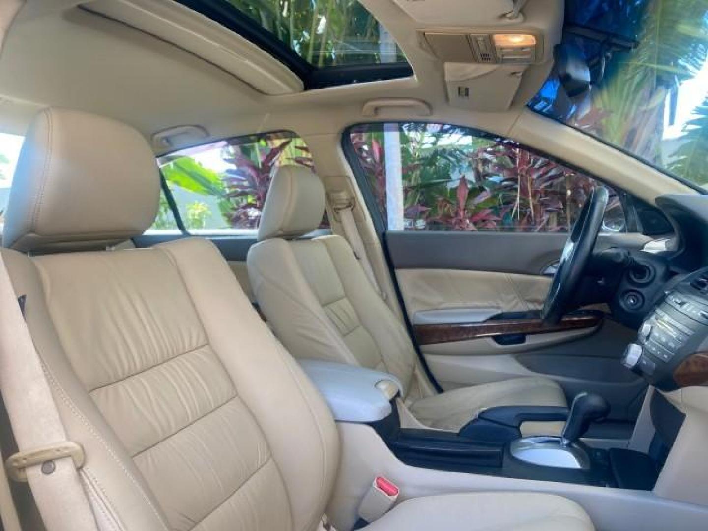 2010 Crystal Black Pearl /Ivory Honda Accord Sdn EX-L LOW MILES 68,158 (1HGCP3F8XAA) with an 3.5L SOHC MPFI 24-Valve i-VTEC V6 Engine engine, Automatic transmission, located at 4701 North Dixie Hwy, Pompano Beach, FL, 33064, (954) 422-2889, 26.240938, -80.123474 - OUR WEBPAGE FLORIDACARS1.COM HAS OVER 100 PHOTOS AND FREE CARFAX LINK 2010 HONDA ACCORD EX-L V6 VIN: 1HGCP3F8XAA027761 1 H G C P 3 F 8 X A A 0 2 7 7 6 1 SEDAN 4 DR 3.5L V6 F SOHC 24V GASOLINE FRONT WHEEL DRIVE Features ABS Brakes Air Conditioning Alloy Wheels AM/FM Stereo Automatic Transmission Auxi - Photo#99