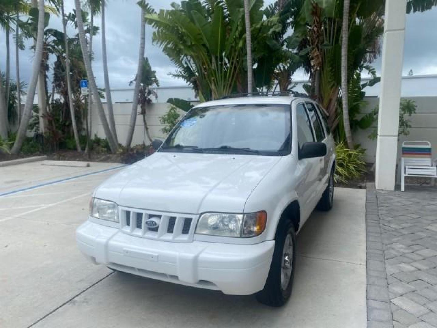 2002 White /Gray Kia Sportage SUV LOW MILES 37,679 (KNDJB723325) with an 2.0L DOHC MPFI 16-Valve Inline 4-Cyl Engine engine, Automatic transmission, located at 4701 North Dixie Hwy, Pompano Beach, FL, 33064, (954) 422-2889, 26.240938, -80.123474 - OUR WEBPAGE FLORIDACARS1.COM HAS OVER 100 PHOTOS AND FREE CARFAX LINK 2002 KIA SPORTAGE VIN: KNDJB723325123795 K N D J B 7 2 3 3 2 5 1 2 3 7 9 5 4 DOOR WAGON/SPORT UTILITY 2.0L I4 F DOHC 16V GASOLINE REAR WHEEL DRIVE Features Air Conditioning Alloy Wheels AM/FM Stereo Automatic Transmission CD Audio - Photo#3