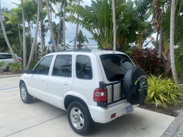 2002 White /Gray Kia Sportage SUV LOW MILES 37,688 (KNDJB723325) with an 2.0L DOHC MPFI 16-Valve Inline 4-Cyl Engine engine, Automatic transmission, located at 4701 North Dixie Hwy, Pompano Beach, FL, 33064, (954) 422-2889, 26.240938, -80.123474 - OUR WEBPAGE FLORIDACARS1.COM HAS OVER 100 PHOTOS AND FREE CARFAX LINK 2002 KIA SPORTAGE VIN: KNDJB723325123795 K N D J B 7 2 3 3 2 5 1 2 3 7 9 5 4 DOOR WAGON/SPORT UTILITY 2.0L I4 F DOHC 16V GASOLINE REAR WHEEL DRIVE Features Air Conditioning Alloy Wheels AM/FM Stereo Automatic Transmission CD Audio - Photo#5