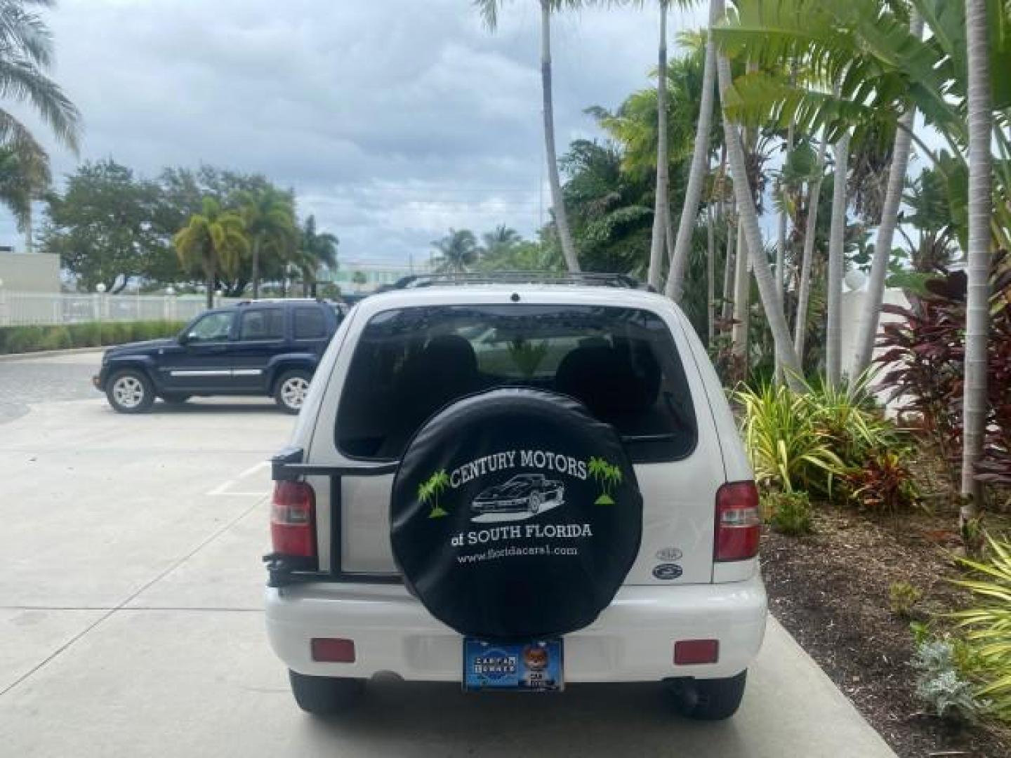 2002 White /Gray Kia Sportage SUV LOW MILES 37,679 (KNDJB723325) with an 2.0L DOHC MPFI 16-Valve Inline 4-Cyl Engine engine, Automatic transmission, located at 4701 North Dixie Hwy, Pompano Beach, FL, 33064, (954) 422-2889, 26.240938, -80.123474 - OUR WEBPAGE FLORIDACARS1.COM HAS OVER 100 PHOTOS AND FREE CARFAX LINK 2002 KIA SPORTAGE VIN: KNDJB723325123795 K N D J B 7 2 3 3 2 5 1 2 3 7 9 5 4 DOOR WAGON/SPORT UTILITY 2.0L I4 F DOHC 16V GASOLINE REAR WHEEL DRIVE Features Air Conditioning Alloy Wheels AM/FM Stereo Automatic Transmission CD Audio - Photo#6
