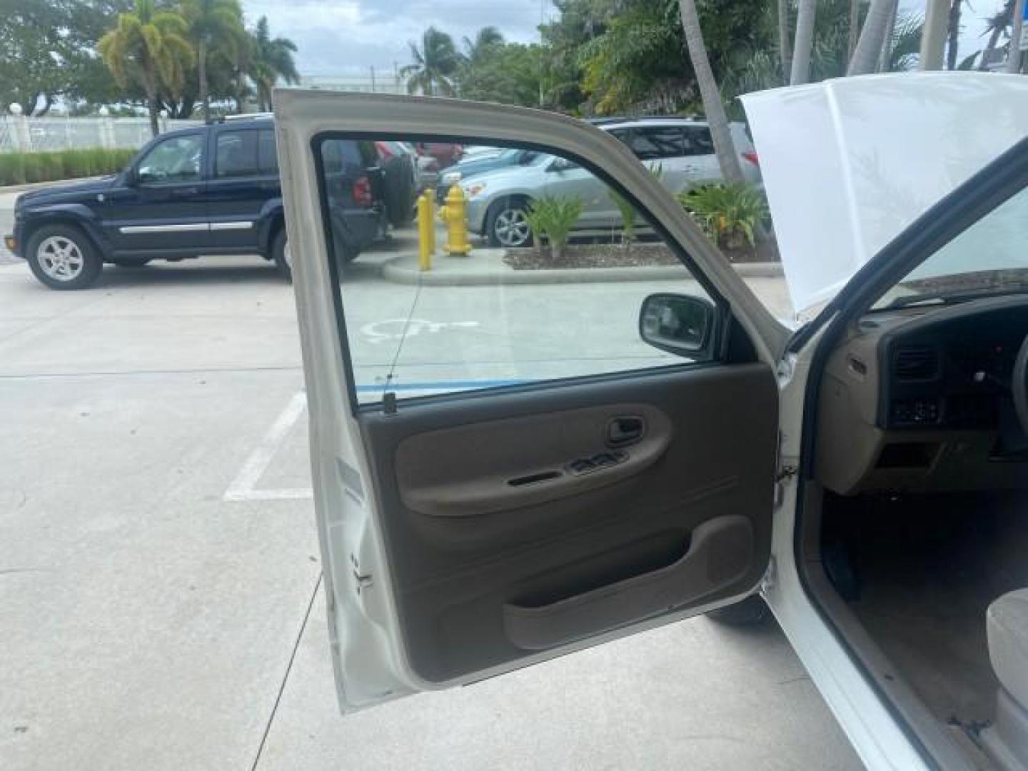 2002 White /Gray Kia Sportage SUV LOW MILES 37,679 (KNDJB723325) with an 2.0L DOHC MPFI 16-Valve Inline 4-Cyl Engine engine, Automatic transmission, located at 4701 North Dixie Hwy, Pompano Beach, FL, 33064, (954) 422-2889, 26.240938, -80.123474 - OUR WEBPAGE FLORIDACARS1.COM HAS OVER 100 PHOTOS AND FREE CARFAX LINK 2002 KIA SPORTAGE VIN: KNDJB723325123795 K N D J B 7 2 3 3 2 5 1 2 3 7 9 5 4 DOOR WAGON/SPORT UTILITY 2.0L I4 F DOHC 16V GASOLINE REAR WHEEL DRIVE Features Air Conditioning Alloy Wheels AM/FM Stereo Automatic Transmission CD Audio - Photo#9