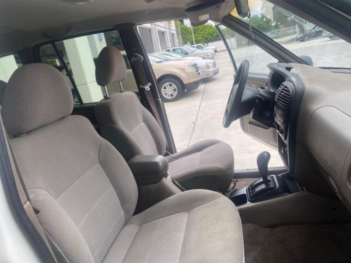 2002 White /Gray Kia Sportage SUV LOW MILES 37,679 (KNDJB723325) with an 2.0L DOHC MPFI 16-Valve Inline 4-Cyl Engine engine, Automatic transmission, located at 4701 North Dixie Hwy, Pompano Beach, FL, 33064, (954) 422-2889, 26.240938, -80.123474 - OUR WEBPAGE FLORIDACARS1.COM HAS OVER 100 PHOTOS AND FREE CARFAX LINK 2002 KIA SPORTAGE VIN: KNDJB723325123795 K N D J B 7 2 3 3 2 5 1 2 3 7 9 5 4 DOOR WAGON/SPORT UTILITY 2.0L I4 F DOHC 16V GASOLINE REAR WHEEL DRIVE Features Air Conditioning Alloy Wheels AM/FM Stereo Automatic Transmission CD Audio - Photo#12