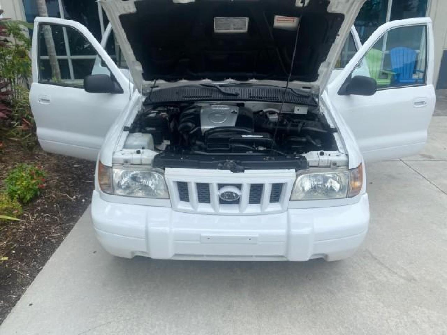 2002 White /Gray Kia Sportage SUV LOW MILES 37,679 (KNDJB723325) with an 2.0L DOHC MPFI 16-Valve Inline 4-Cyl Engine engine, Automatic transmission, located at 4701 North Dixie Hwy, Pompano Beach, FL, 33064, (954) 422-2889, 26.240938, -80.123474 - OUR WEBPAGE FLORIDACARS1.COM HAS OVER 100 PHOTOS AND FREE CARFAX LINK 2002 KIA SPORTAGE VIN: KNDJB723325123795 K N D J B 7 2 3 3 2 5 1 2 3 7 9 5 4 DOOR WAGON/SPORT UTILITY 2.0L I4 F DOHC 16V GASOLINE REAR WHEEL DRIVE Features Air Conditioning Alloy Wheels AM/FM Stereo Automatic Transmission CD Audio - Photo#17