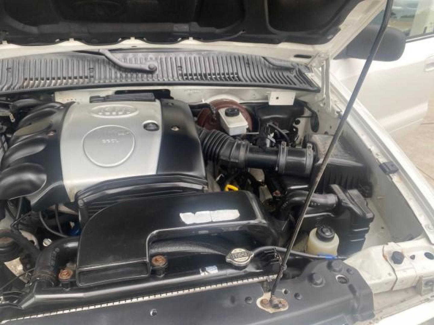 2002 White /Gray Kia Sportage SUV LOW MILES 37,679 (KNDJB723325) with an 2.0L DOHC MPFI 16-Valve Inline 4-Cyl Engine engine, Automatic transmission, located at 4701 North Dixie Hwy, Pompano Beach, FL, 33064, (954) 422-2889, 26.240938, -80.123474 - OUR WEBPAGE FLORIDACARS1.COM HAS OVER 100 PHOTOS AND FREE CARFAX LINK 2002 KIA SPORTAGE VIN: KNDJB723325123795 K N D J B 7 2 3 3 2 5 1 2 3 7 9 5 4 DOOR WAGON/SPORT UTILITY 2.0L I4 F DOHC 16V GASOLINE REAR WHEEL DRIVE Features Air Conditioning Alloy Wheels AM/FM Stereo Automatic Transmission CD Audio - Photo#26