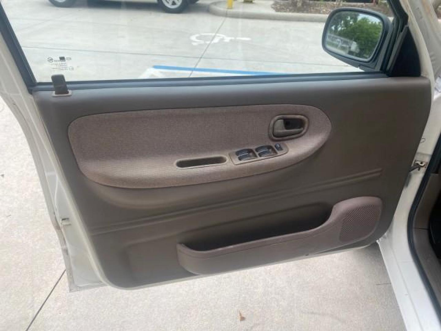 2002 White /Gray Kia Sportage SUV LOW MILES 37,679 (KNDJB723325) with an 2.0L DOHC MPFI 16-Valve Inline 4-Cyl Engine engine, Automatic transmission, located at 4701 North Dixie Hwy, Pompano Beach, FL, 33064, (954) 422-2889, 26.240938, -80.123474 - OUR WEBPAGE FLORIDACARS1.COM HAS OVER 100 PHOTOS AND FREE CARFAX LINK 2002 KIA SPORTAGE VIN: KNDJB723325123795 K N D J B 7 2 3 3 2 5 1 2 3 7 9 5 4 DOOR WAGON/SPORT UTILITY 2.0L I4 F DOHC 16V GASOLINE REAR WHEEL DRIVE Features Air Conditioning Alloy Wheels AM/FM Stereo Automatic Transmission CD Audio - Photo#31