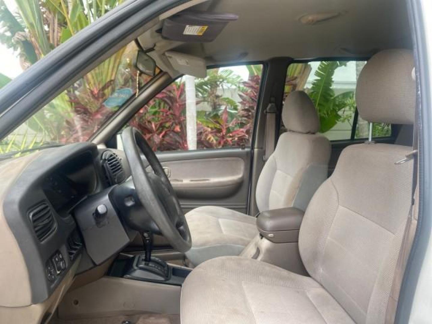 2002 White /Gray Kia Sportage SUV LOW MILES 37,679 (KNDJB723325) with an 2.0L DOHC MPFI 16-Valve Inline 4-Cyl Engine engine, Automatic transmission, located at 4701 North Dixie Hwy, Pompano Beach, FL, 33064, (954) 422-2889, 26.240938, -80.123474 - OUR WEBPAGE FLORIDACARS1.COM HAS OVER 100 PHOTOS AND FREE CARFAX LINK 2002 KIA SPORTAGE VIN: KNDJB723325123795 K N D J B 7 2 3 3 2 5 1 2 3 7 9 5 4 DOOR WAGON/SPORT UTILITY 2.0L I4 F DOHC 16V GASOLINE REAR WHEEL DRIVE Features Air Conditioning Alloy Wheels AM/FM Stereo Automatic Transmission CD Audio - Photo#33