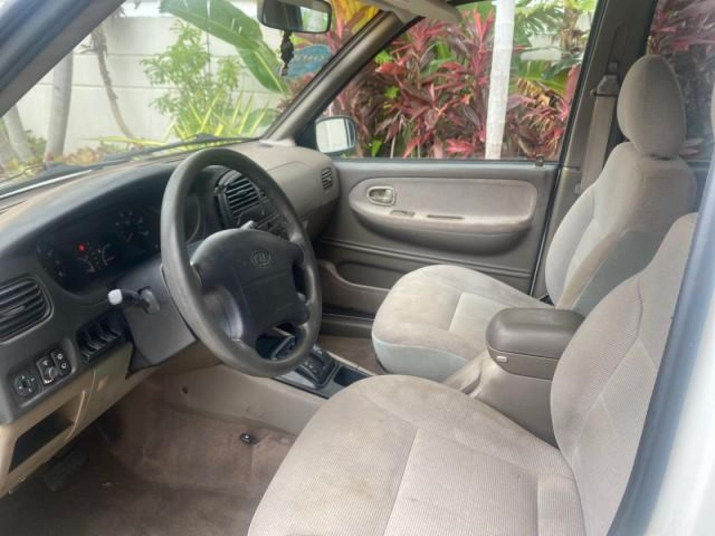 2002 White /Gray Kia Sportage SUV LOW MILES 37,679 (KNDJB723325) with an 2.0L DOHC MPFI 16-Valve Inline 4-Cyl Engine engine, Automatic transmission, located at 4701 North Dixie Hwy, Pompano Beach, FL, 33064, (954) 422-2889, 26.240938, -80.123474 - OUR WEBPAGE FLORIDACARS1.COM HAS OVER 100 PHOTOS AND FREE CARFAX LINK 2002 KIA SPORTAGE VIN: KNDJB723325123795 K N D J B 7 2 3 3 2 5 1 2 3 7 9 5 4 DOOR WAGON/SPORT UTILITY 2.0L I4 F DOHC 16V GASOLINE REAR WHEEL DRIVE Features Air Conditioning Alloy Wheels AM/FM Stereo Automatic Transmission CD Audio - Photo#35