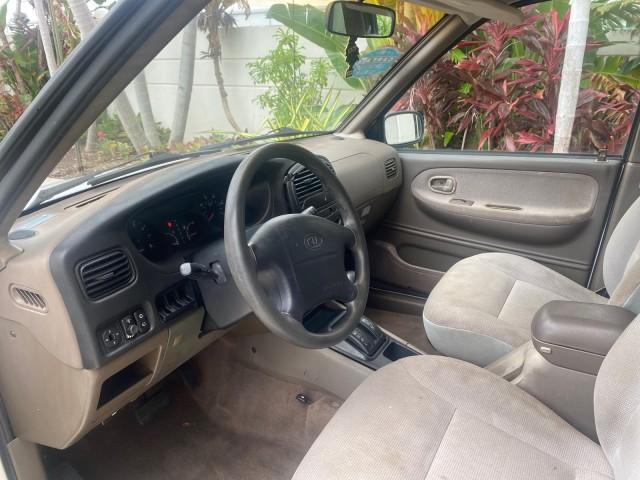 2002 White /Gray Kia Sportage SUV LOW MILES 37,688 (KNDJB723325) with an 2.0L DOHC MPFI 16-Valve Inline 4-Cyl Engine engine, Automatic transmission, located at 4701 North Dixie Hwy, Pompano Beach, FL, 33064, (954) 422-2889, 26.240938, -80.123474 - OUR WEBPAGE FLORIDACARS1.COM HAS OVER 100 PHOTOS AND FREE CARFAX LINK 2002 KIA SPORTAGE VIN: KNDJB723325123795 K N D J B 7 2 3 3 2 5 1 2 3 7 9 5 4 DOOR WAGON/SPORT UTILITY 2.0L I4 F DOHC 16V GASOLINE REAR WHEEL DRIVE Features Air Conditioning Alloy Wheels AM/FM Stereo Automatic Transmission CD Audio - Photo#36