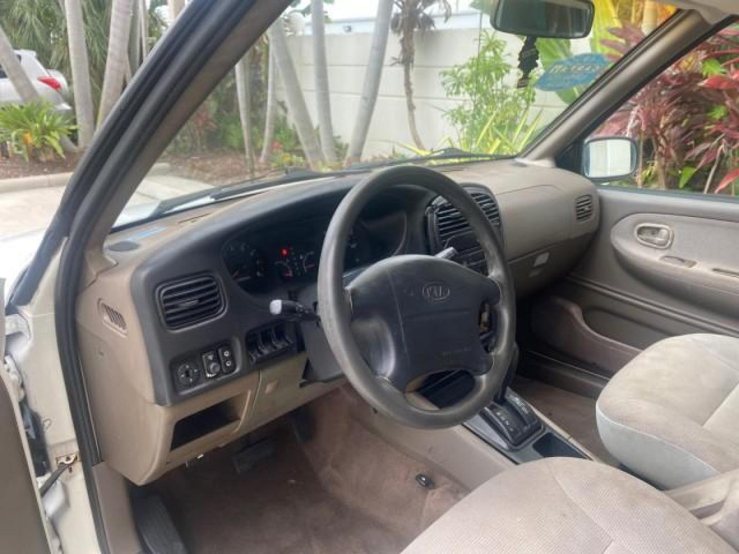 2002 White /Gray Kia Sportage SUV LOW MILES 37,679 (KNDJB723325) with an 2.0L DOHC MPFI 16-Valve Inline 4-Cyl Engine engine, Automatic transmission, located at 4701 North Dixie Hwy, Pompano Beach, FL, 33064, (954) 422-2889, 26.240938, -80.123474 - OUR WEBPAGE FLORIDACARS1.COM HAS OVER 100 PHOTOS AND FREE CARFAX LINK 2002 KIA SPORTAGE VIN: KNDJB723325123795 K N D J B 7 2 3 3 2 5 1 2 3 7 9 5 4 DOOR WAGON/SPORT UTILITY 2.0L I4 F DOHC 16V GASOLINE REAR WHEEL DRIVE Features Air Conditioning Alloy Wheels AM/FM Stereo Automatic Transmission CD Audio - Photo#37
