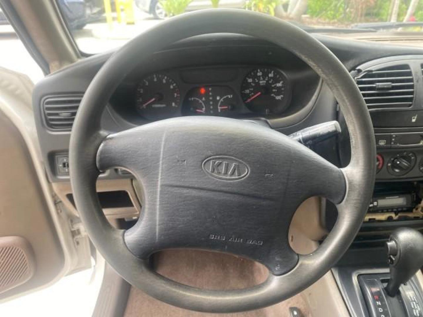 2002 White /Gray Kia Sportage SUV LOW MILES 37,679 (KNDJB723325) with an 2.0L DOHC MPFI 16-Valve Inline 4-Cyl Engine engine, Automatic transmission, located at 4701 North Dixie Hwy, Pompano Beach, FL, 33064, (954) 422-2889, 26.240938, -80.123474 - OUR WEBPAGE FLORIDACARS1.COM HAS OVER 100 PHOTOS AND FREE CARFAX LINK 2002 KIA SPORTAGE VIN: KNDJB723325123795 K N D J B 7 2 3 3 2 5 1 2 3 7 9 5 4 DOOR WAGON/SPORT UTILITY 2.0L I4 F DOHC 16V GASOLINE REAR WHEEL DRIVE Features Air Conditioning Alloy Wheels AM/FM Stereo Automatic Transmission CD Audio - Photo#38