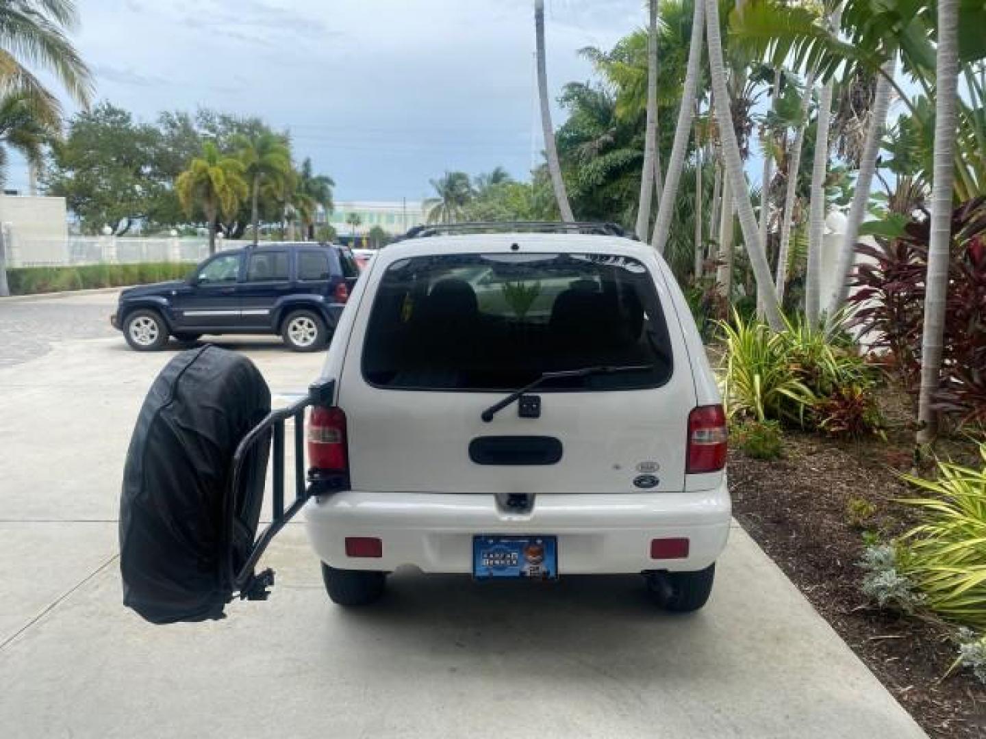 2002 White /Gray Kia Sportage SUV LOW MILES 37,679 (KNDJB723325) with an 2.0L DOHC MPFI 16-Valve Inline 4-Cyl Engine engine, Automatic transmission, located at 4701 North Dixie Hwy, Pompano Beach, FL, 33064, (954) 422-2889, 26.240938, -80.123474 - OUR WEBPAGE FLORIDACARS1.COM HAS OVER 100 PHOTOS AND FREE CARFAX LINK 2002 KIA SPORTAGE VIN: KNDJB723325123795 K N D J B 7 2 3 3 2 5 1 2 3 7 9 5 4 DOOR WAGON/SPORT UTILITY 2.0L I4 F DOHC 16V GASOLINE REAR WHEEL DRIVE Features Air Conditioning Alloy Wheels AM/FM Stereo Automatic Transmission CD Audio - Photo#70
