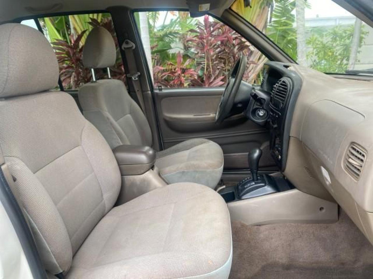 2002 White /Gray Kia Sportage SUV LOW MILES 37,679 (KNDJB723325) with an 2.0L DOHC MPFI 16-Valve Inline 4-Cyl Engine engine, Automatic transmission, located at 4701 North Dixie Hwy, Pompano Beach, FL, 33064, (954) 422-2889, 26.240938, -80.123474 - OUR WEBPAGE FLORIDACARS1.COM HAS OVER 100 PHOTOS AND FREE CARFAX LINK 2002 KIA SPORTAGE VIN: KNDJB723325123795 K N D J B 7 2 3 3 2 5 1 2 3 7 9 5 4 DOOR WAGON/SPORT UTILITY 2.0L I4 F DOHC 16V GASOLINE REAR WHEEL DRIVE Features Air Conditioning Alloy Wheels AM/FM Stereo Automatic Transmission CD Audio - Photo#84