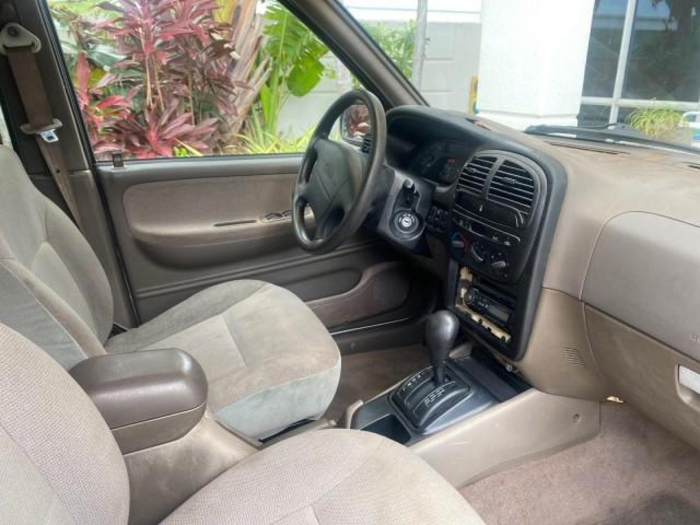 2002 White /Gray Kia Sportage SUV LOW MILES 37,679 (KNDJB723325) with an 2.0L DOHC MPFI 16-Valve Inline 4-Cyl Engine engine, Automatic transmission, located at 4701 North Dixie Hwy, Pompano Beach, FL, 33064, (954) 422-2889, 26.240938, -80.123474 - OUR WEBPAGE FLORIDACARS1.COM HAS OVER 100 PHOTOS AND FREE CARFAX LINK 2002 KIA SPORTAGE VIN: KNDJB723325123795 K N D J B 7 2 3 3 2 5 1 2 3 7 9 5 4 DOOR WAGON/SPORT UTILITY 2.0L I4 F DOHC 16V GASOLINE REAR WHEEL DRIVE Features Air Conditioning Alloy Wheels AM/FM Stereo Automatic Transmission CD Audio - Photo#86