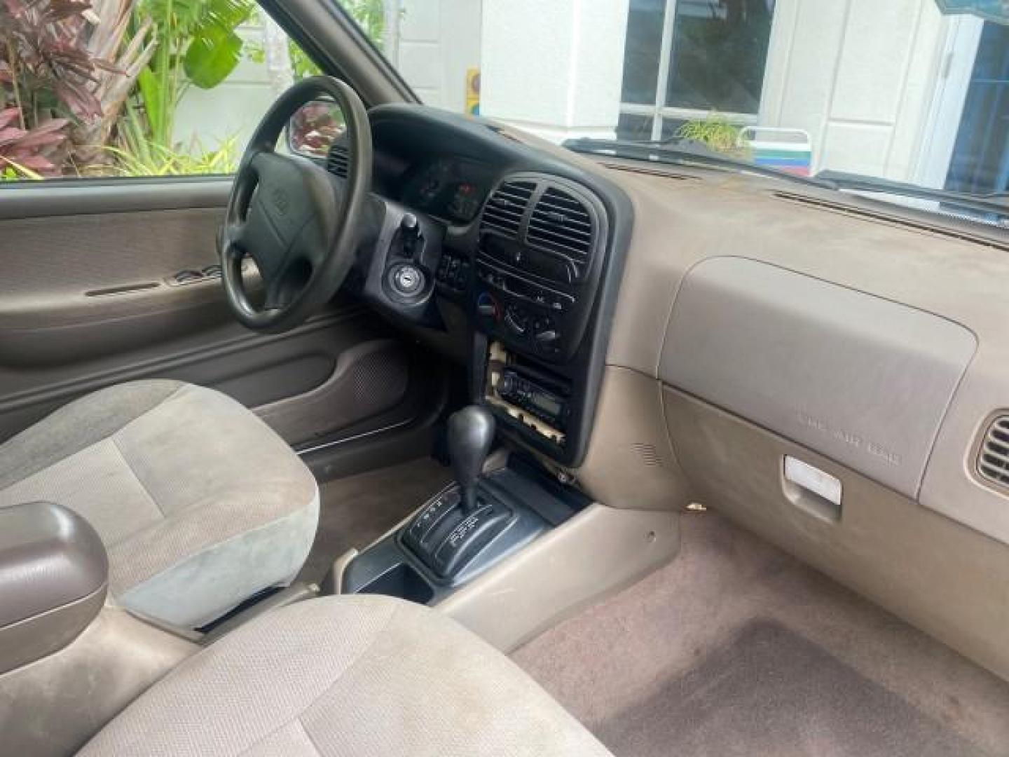 2002 White /Gray Kia Sportage SUV LOW MILES 37,679 (KNDJB723325) with an 2.0L DOHC MPFI 16-Valve Inline 4-Cyl Engine engine, Automatic transmission, located at 4701 North Dixie Hwy, Pompano Beach, FL, 33064, (954) 422-2889, 26.240938, -80.123474 - OUR WEBPAGE FLORIDACARS1.COM HAS OVER 100 PHOTOS AND FREE CARFAX LINK 2002 KIA SPORTAGE VIN: KNDJB723325123795 K N D J B 7 2 3 3 2 5 1 2 3 7 9 5 4 DOOR WAGON/SPORT UTILITY 2.0L I4 F DOHC 16V GASOLINE REAR WHEEL DRIVE Features Air Conditioning Alloy Wheels AM/FM Stereo Automatic Transmission CD Audio - Photo#87