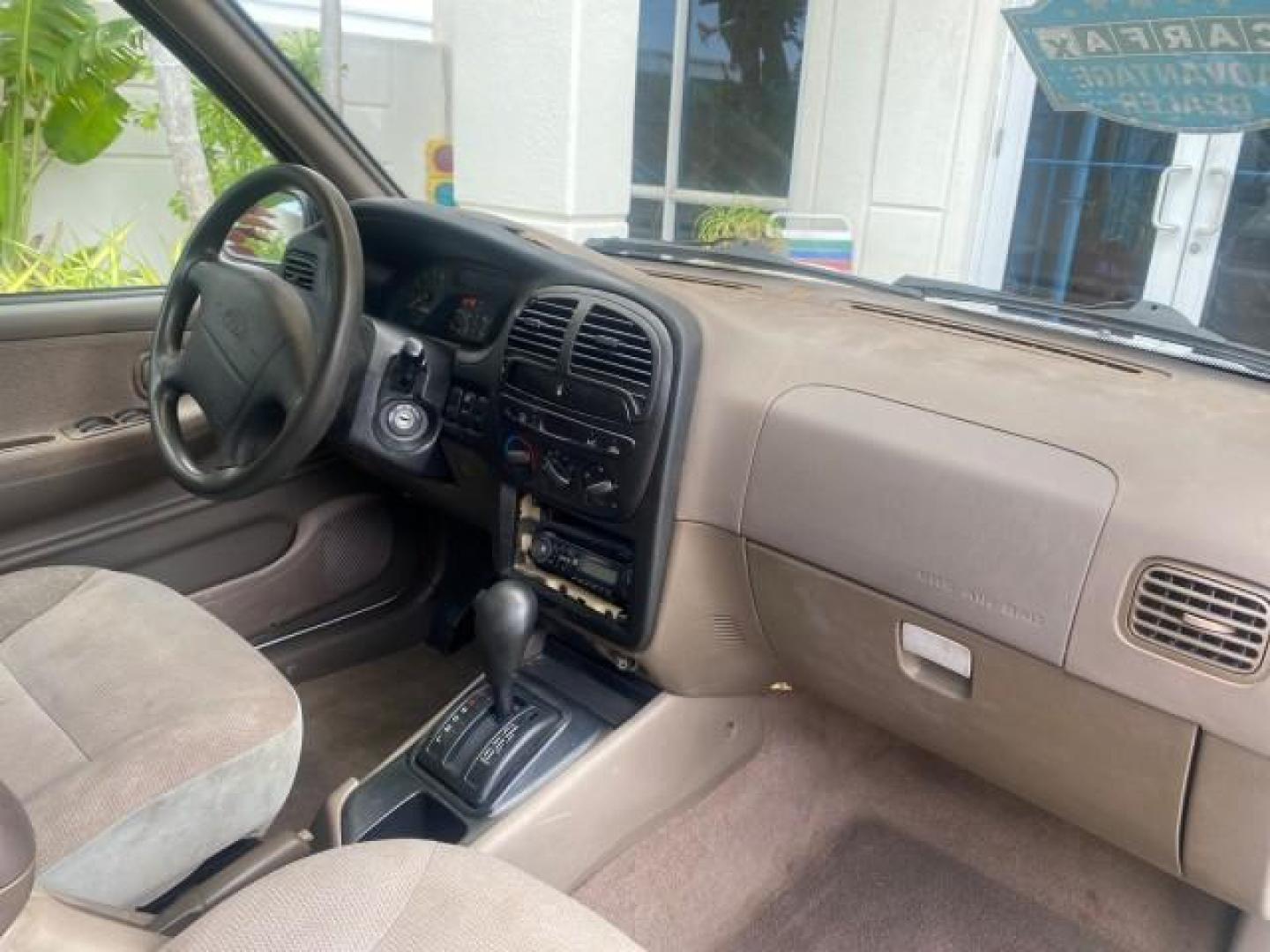 2002 White /Gray Kia Sportage SUV LOW MILES 37,679 (KNDJB723325) with an 2.0L DOHC MPFI 16-Valve Inline 4-Cyl Engine engine, Automatic transmission, located at 4701 North Dixie Hwy, Pompano Beach, FL, 33064, (954) 422-2889, 26.240938, -80.123474 - OUR WEBPAGE FLORIDACARS1.COM HAS OVER 100 PHOTOS AND FREE CARFAX LINK 2002 KIA SPORTAGE VIN: KNDJB723325123795 K N D J B 7 2 3 3 2 5 1 2 3 7 9 5 4 DOOR WAGON/SPORT UTILITY 2.0L I4 F DOHC 16V GASOLINE REAR WHEEL DRIVE Features Air Conditioning Alloy Wheels AM/FM Stereo Automatic Transmission CD Audio - Photo#88
