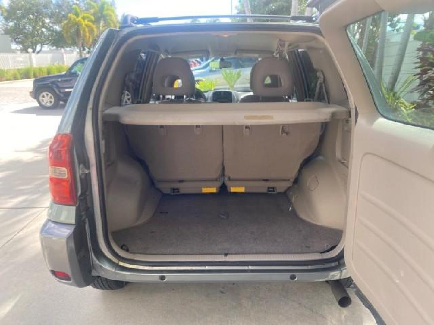 2005 Titanium Metallic /Taupe Toyota RAV4 LOW MILES 46,167 18 SERVICES (JTEGD20V650) with an 2.4L DOHC SFI 16-Valve VVT-i 4-Cyl Engine engine, Automatic transmission, located at 4701 North Dixie Hwy, Pompano Beach, FL, 33064, (954) 422-2889, 26.240938, -80.123474 - OUR WEBPAGE FLORIDACARS1.COM HAS OVER 100 PHOTOS AND FREE CARFAX LINK 2005 TOYOTA RAV4 VIN: JTEGD20V650076982 J T E G D 2 0 V 6 5 0 0 7 6 9 8 2 4 DOOR WAGON/SPORT UTILITY 2.4L I4 F DOHC 16V GASOLINE FRONT WHEEL DRIVE Features ABS Brakes Air Conditioning AM/FM Stereo Automatic Transmission Cassette P - Photo#84
